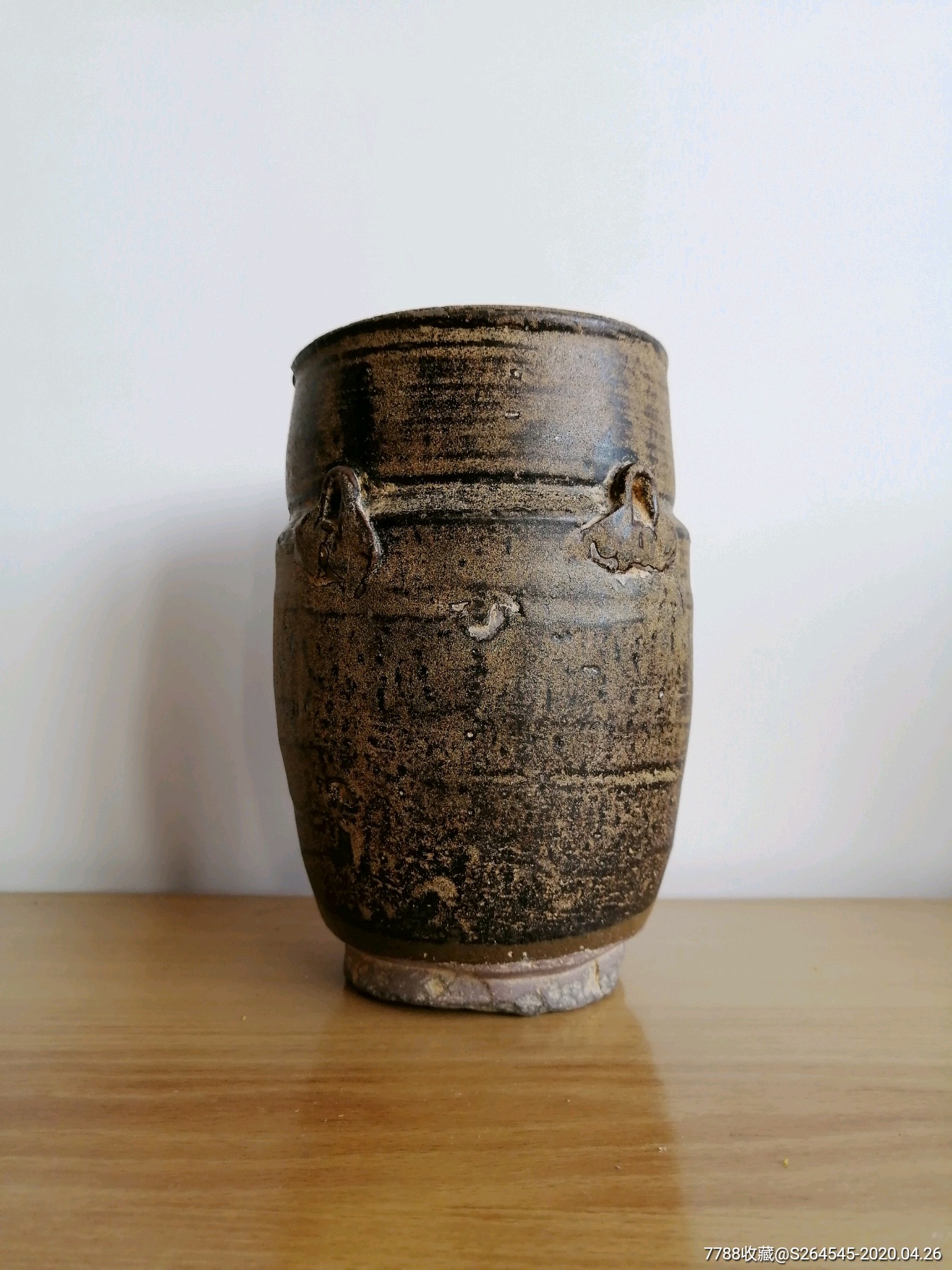 宋代赣州窑紫金釉豹纹四系罐