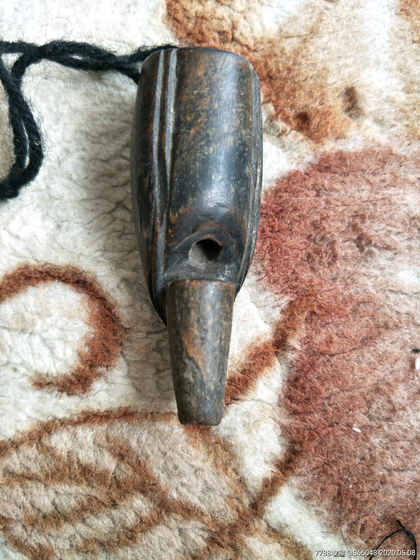 滚动鼠标滚轴,图片即可轻松放大,缩小更多"口哨/哨子