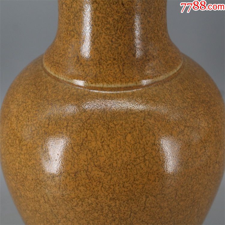 清康熙年制橘黄釉窑变鱼尾瓶