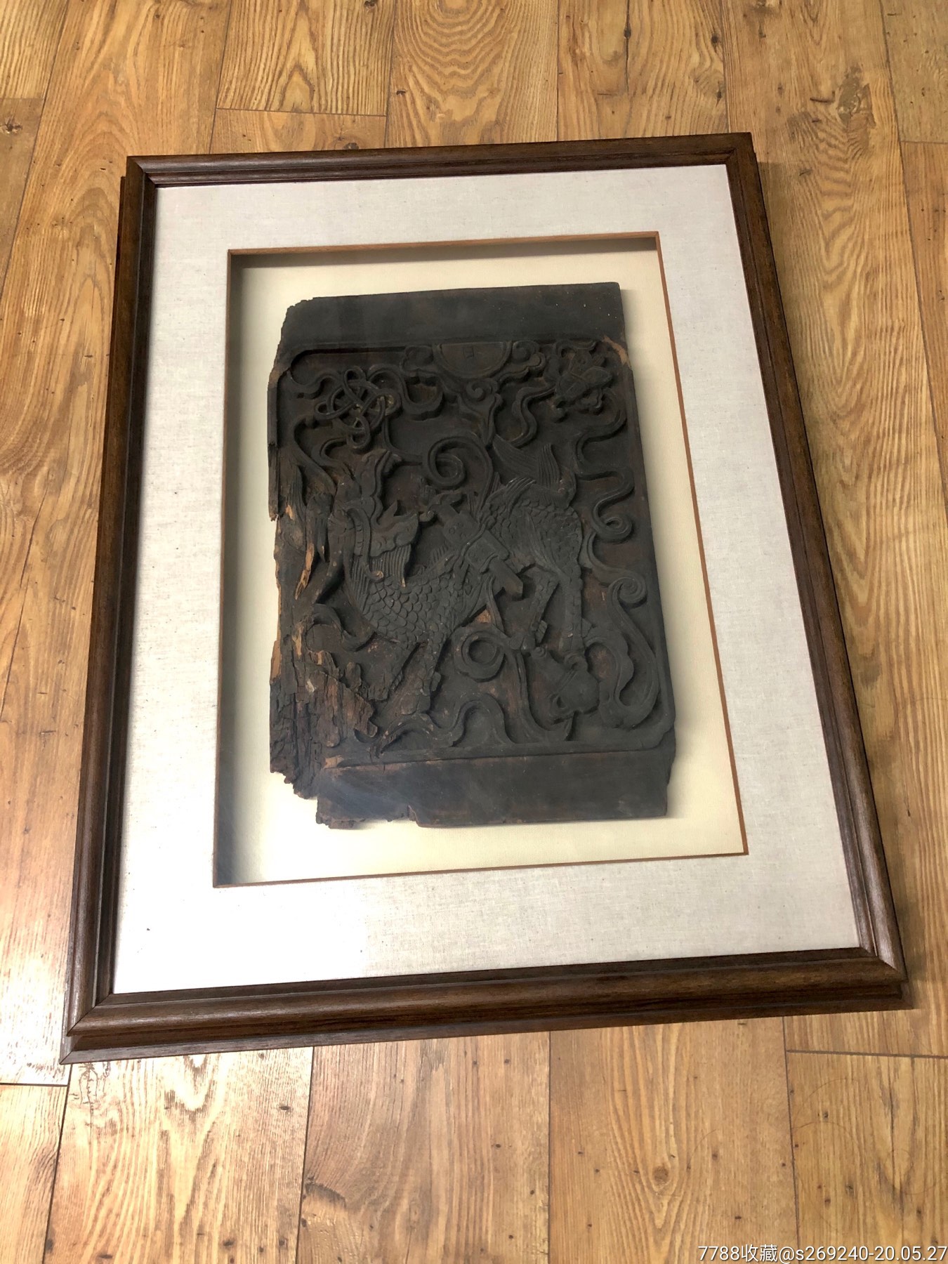 清代麒麟吐玉书木雕挂件