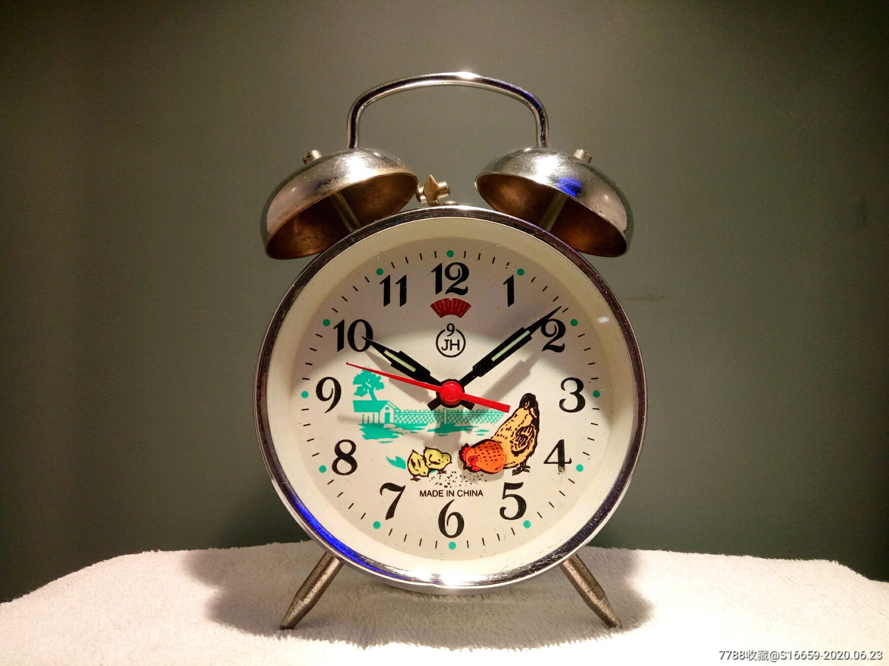 老闹钟母鸡叨米