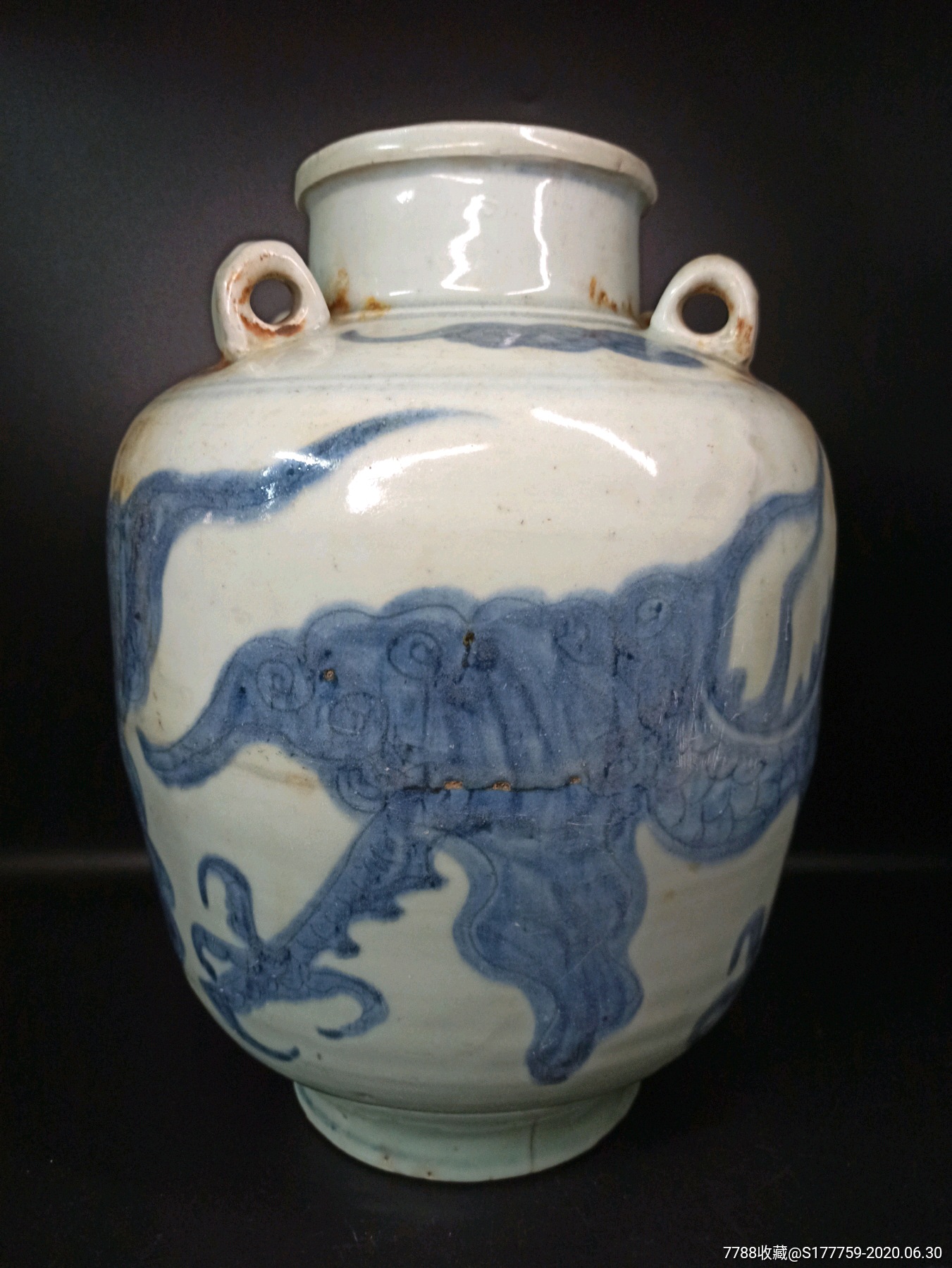 明代青花四爪龙四系提壶高32厘米,口宽12厘米.