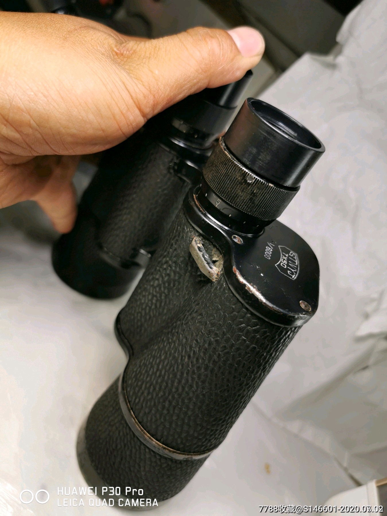 老的劳动牌望远镜外观还行左上木镜齿轮有点打滑