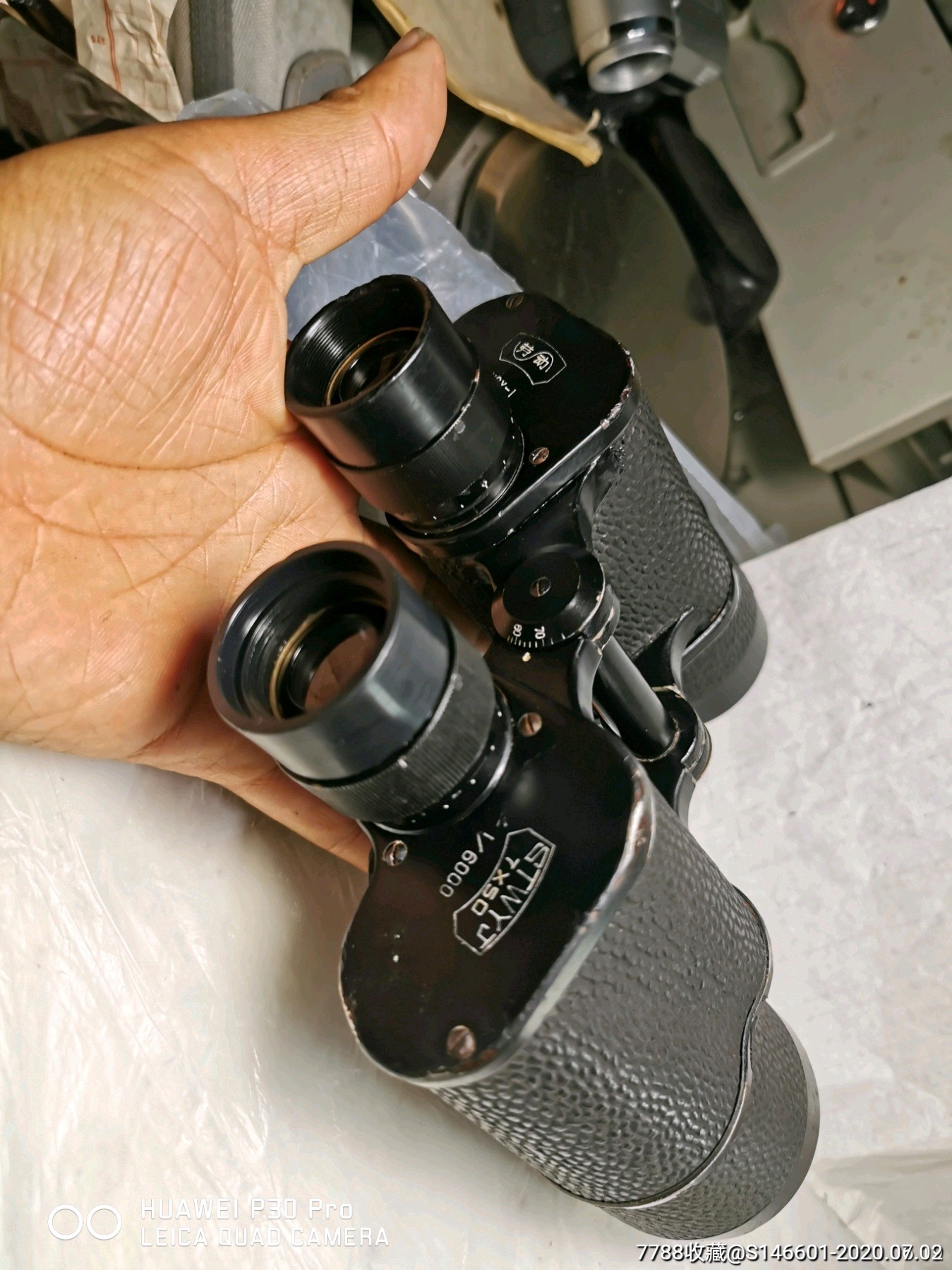 老的劳动牌望远镜外观还行左上木镜齿轮有点打滑