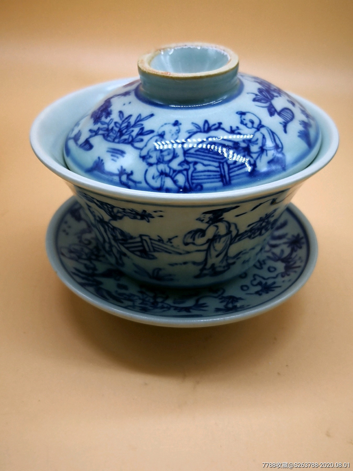 青花人物故事图茶盏托