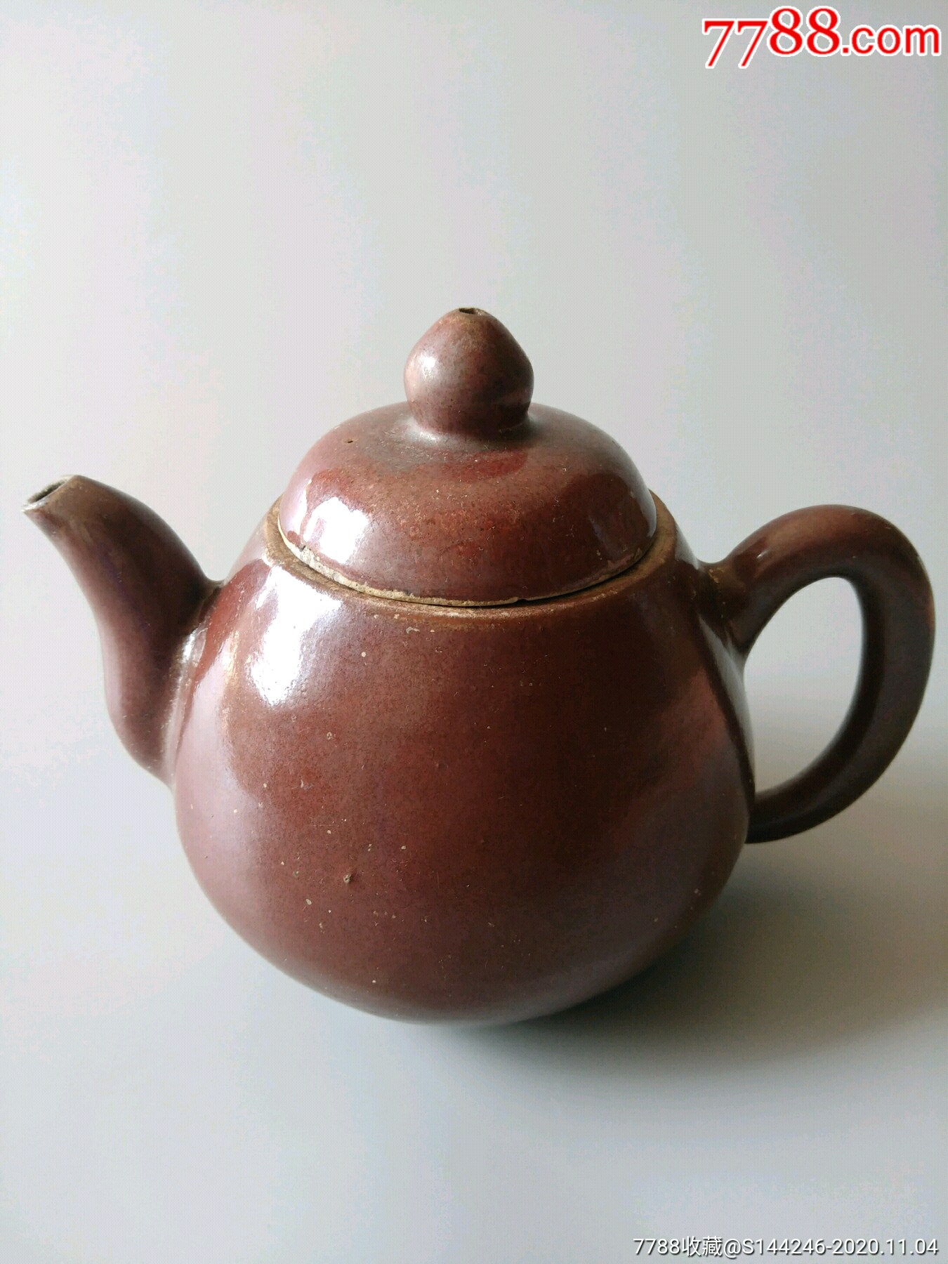 清代酱釉茶壶图片