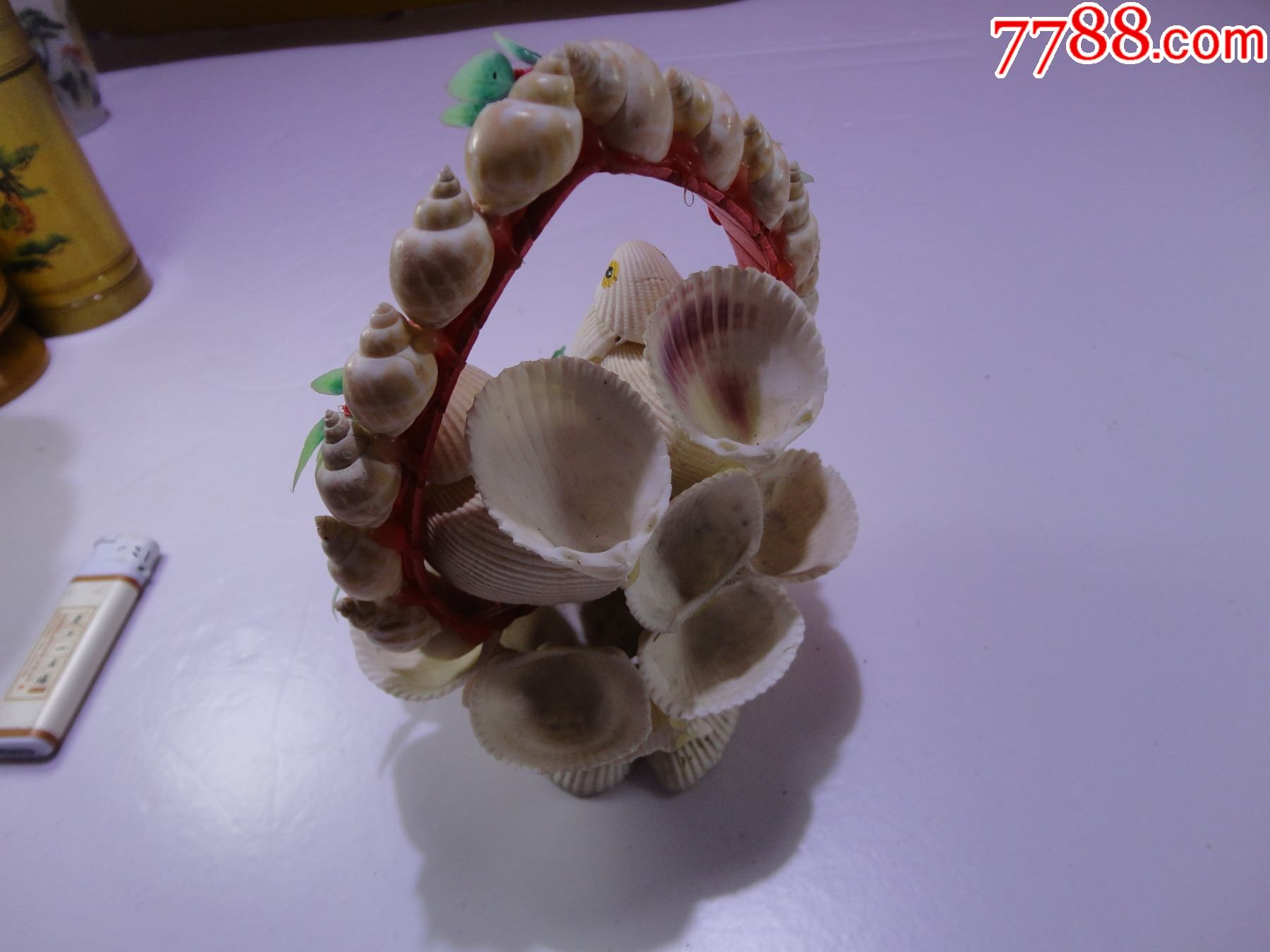 滚动鼠标滚轴,图片即可轻松放大,缩小更多"贝壳饰品