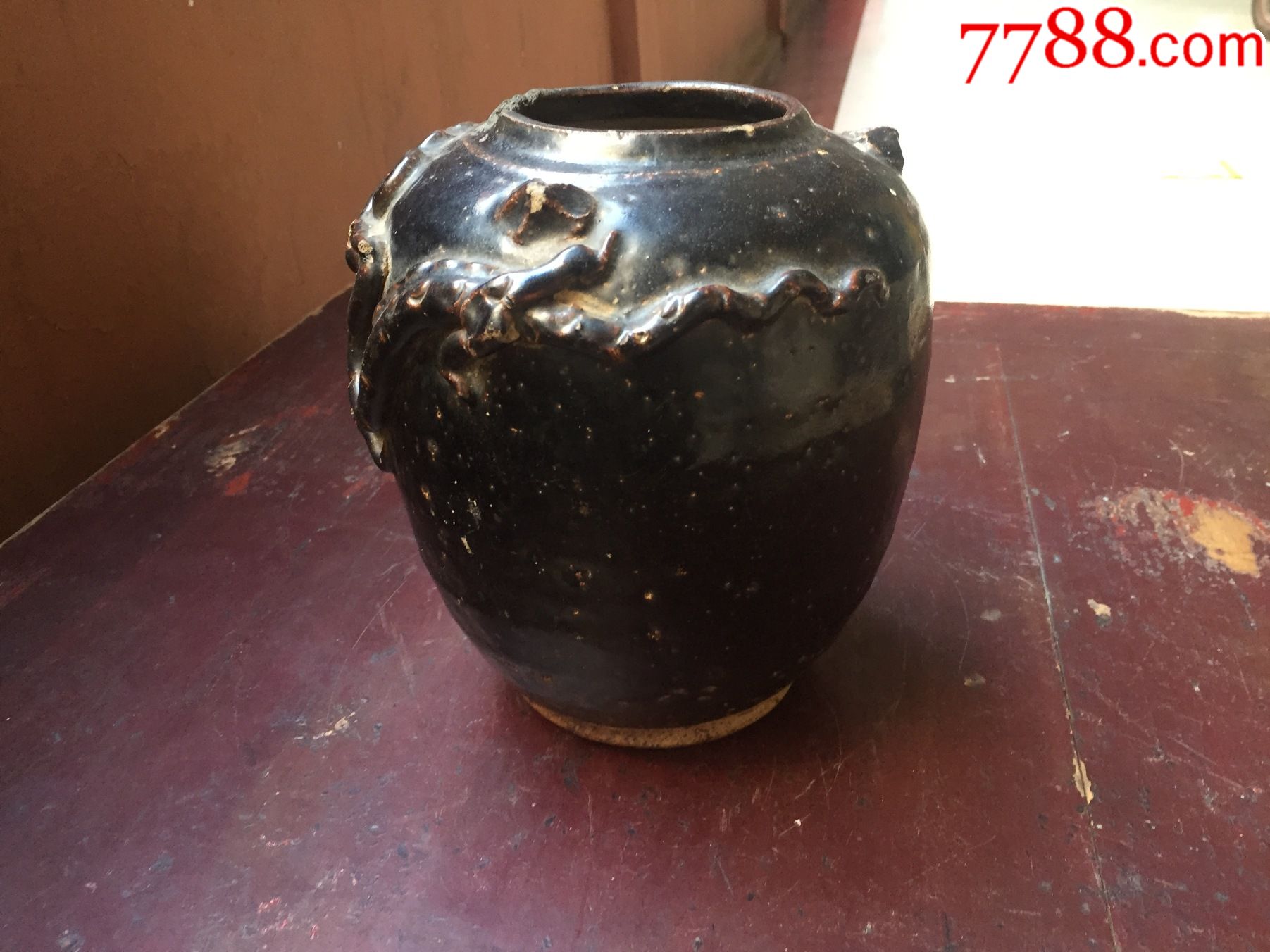 明代黑釉狮子罐