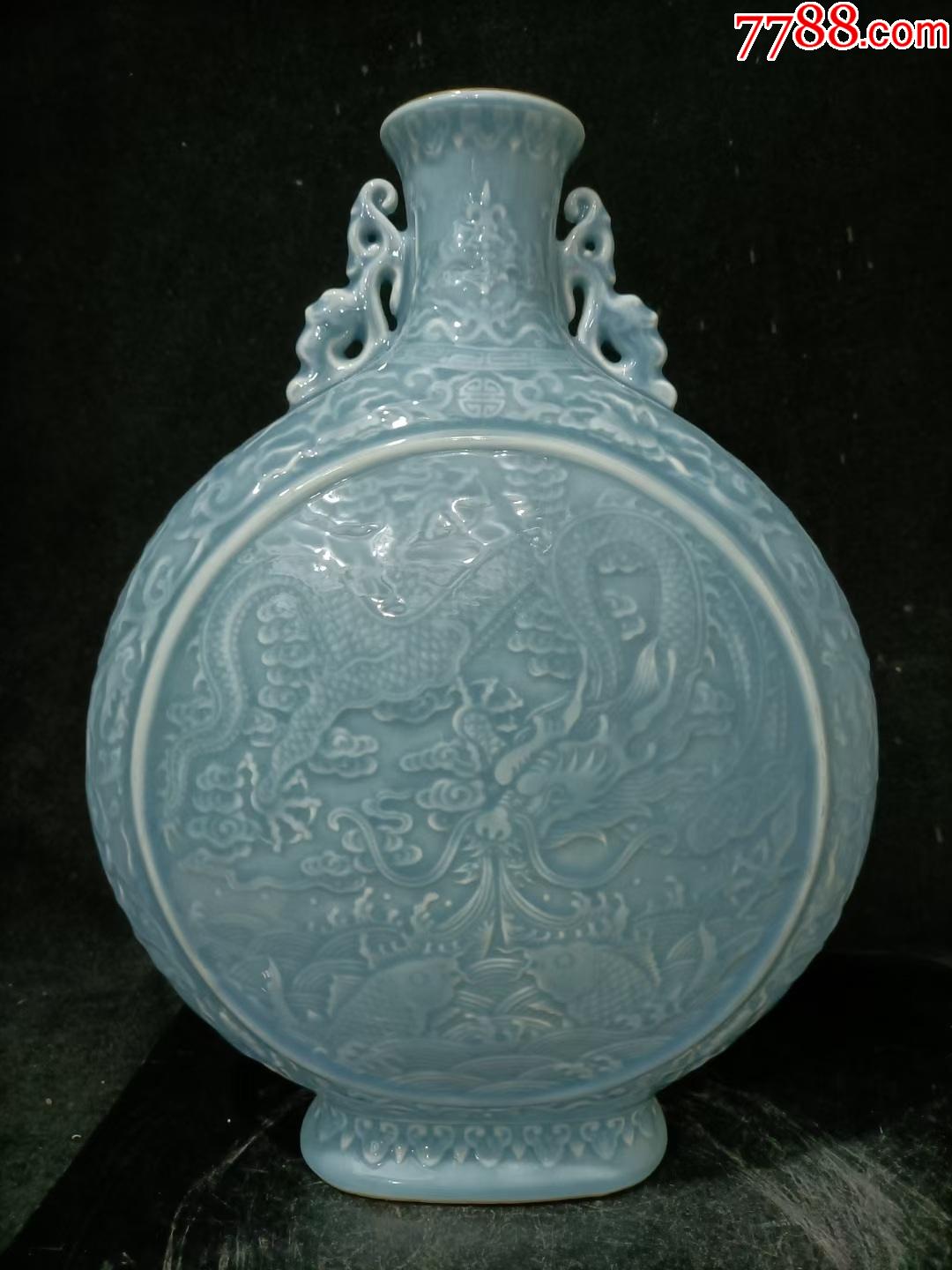 六十年代天青釉雕刻鱼化龙双耳抱月瓶