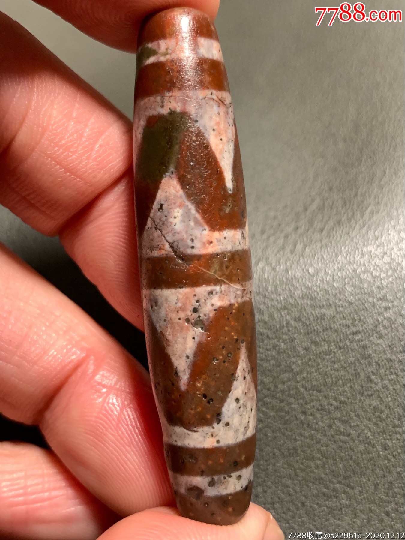 象雄带朱砂双虎牙大天珠57.5*13毫米