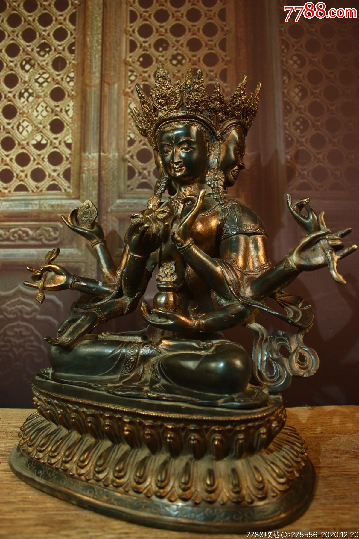 铜鎏金三面八臂佛