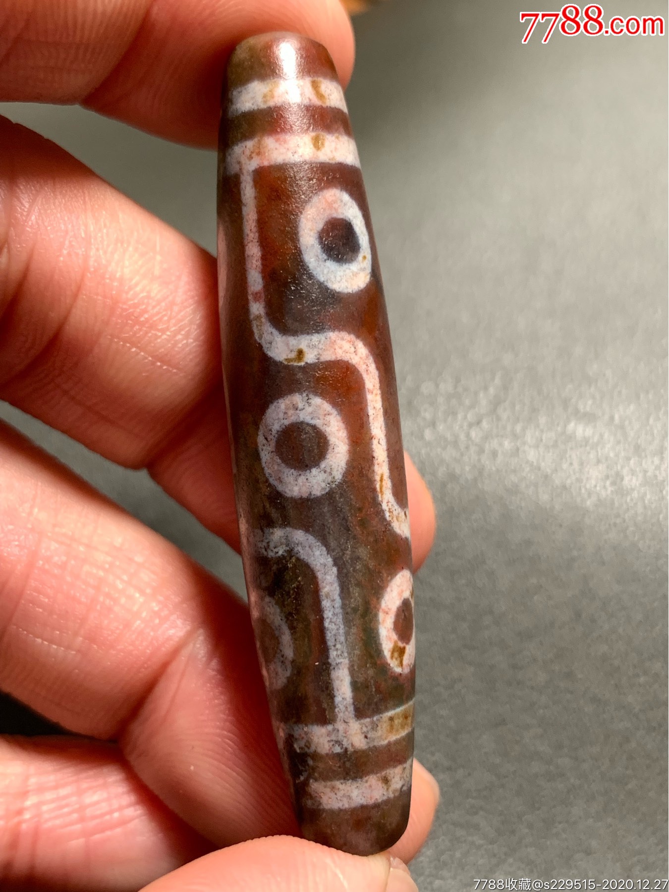 象雄带朱砂九眼大天珠58*12.8毫米-天珠-7788放映机