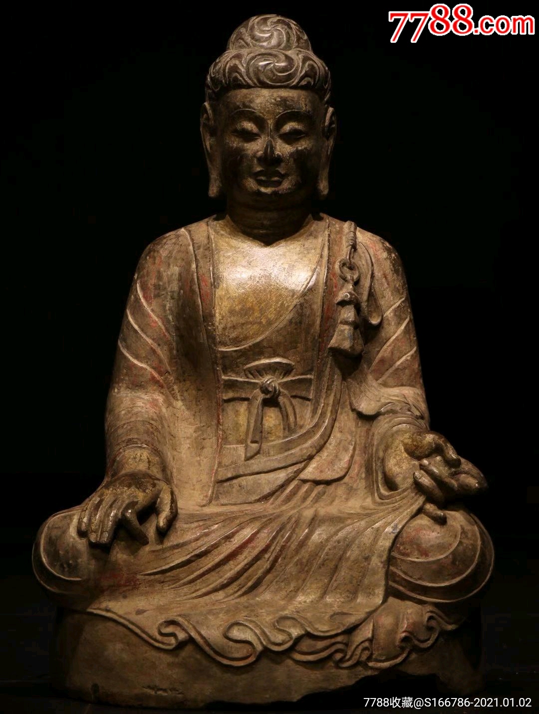 释迦摩尼佛坐像高65长42宽38厘米.青石面庞圆润慈祥端庄大耳下垂水涡