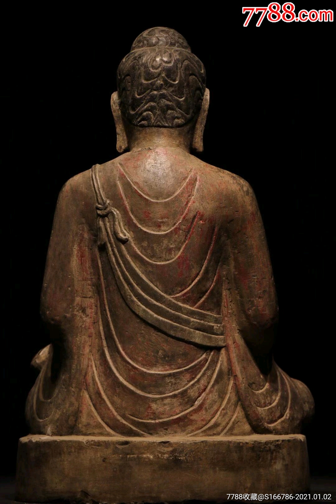 释迦摩尼佛坐像高65长42宽38厘米.青石面庞圆润慈祥端庄大耳下垂水涡