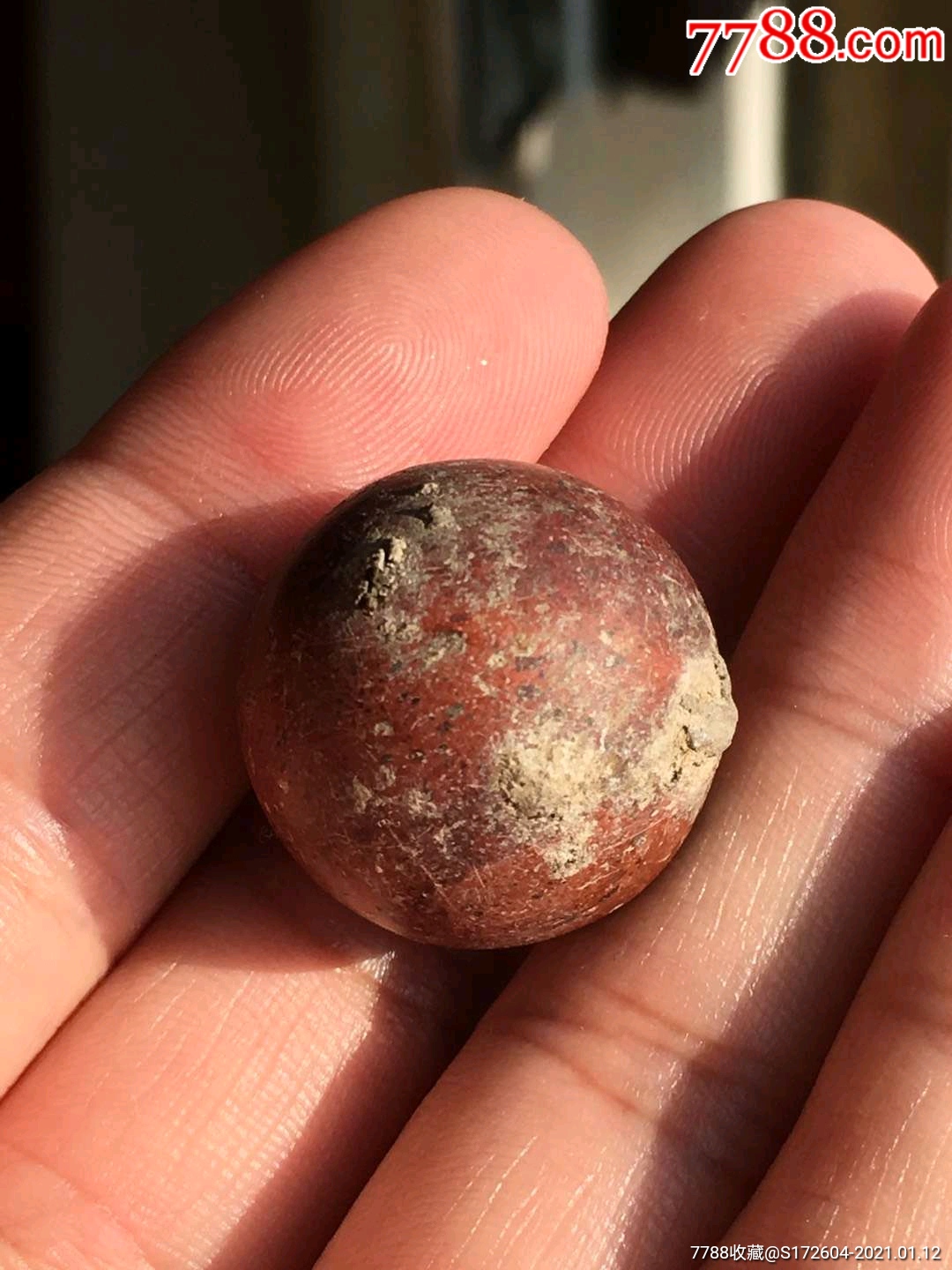 辽金时期鸡肝玛瑙供珠