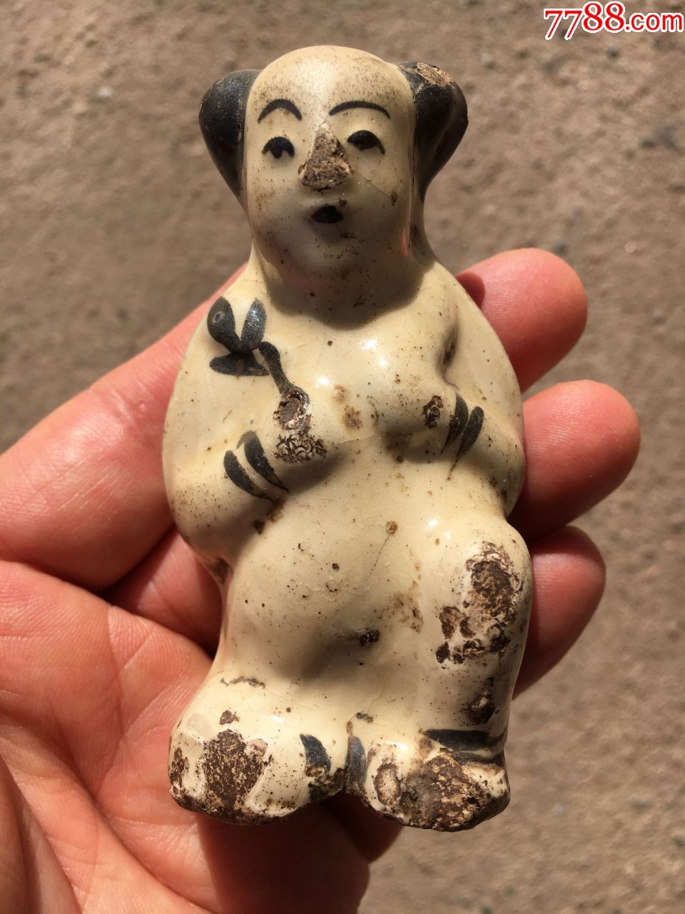 宋金磁州窑白地黑彩瓷塑童子