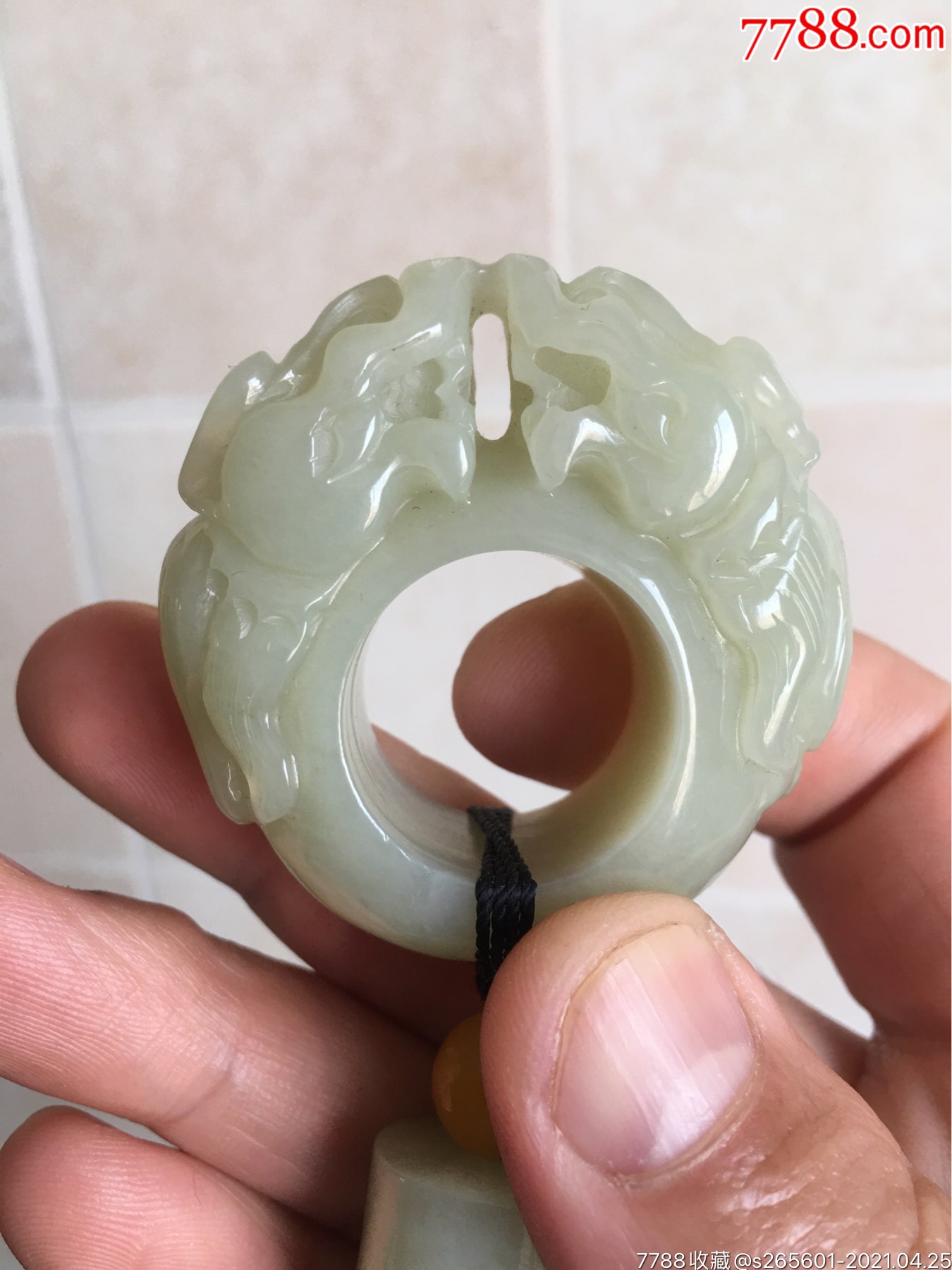 和田玉手把件