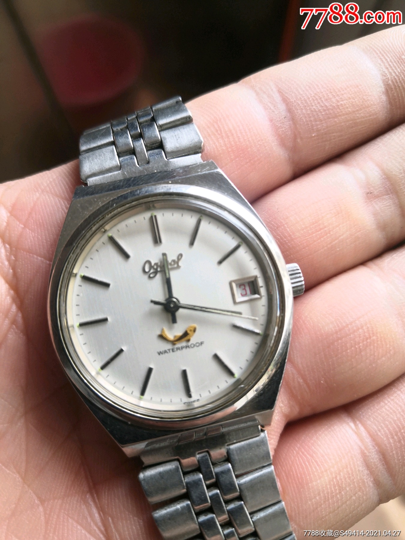 瑞士老牌爱其佛手动男表四条鱼面盘金鱼