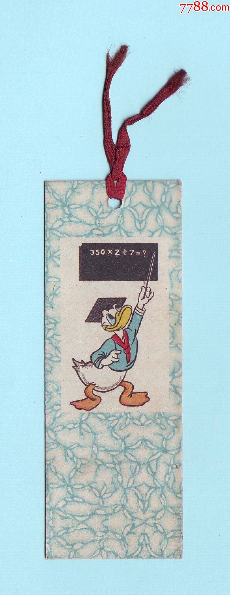 五十年代唐老鸭书签,背面印有标语"高举总路线的红旗,向技术革命,文化