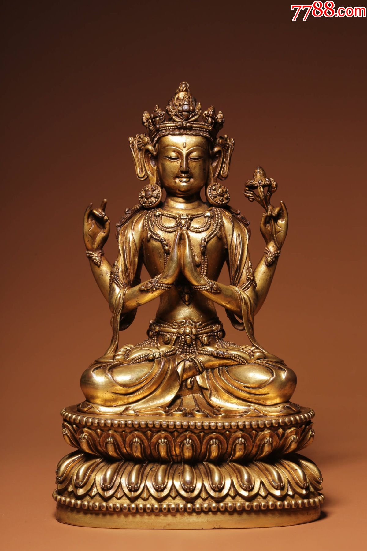 铜鎏金四臂观音坐像