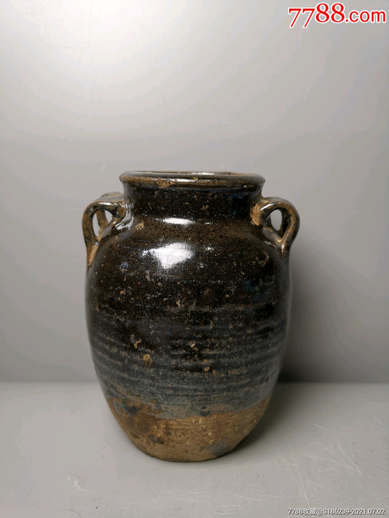 明清老窑瓷酱釉四系罐规格:高145厘米,双耳距115厘米,口径7厘米