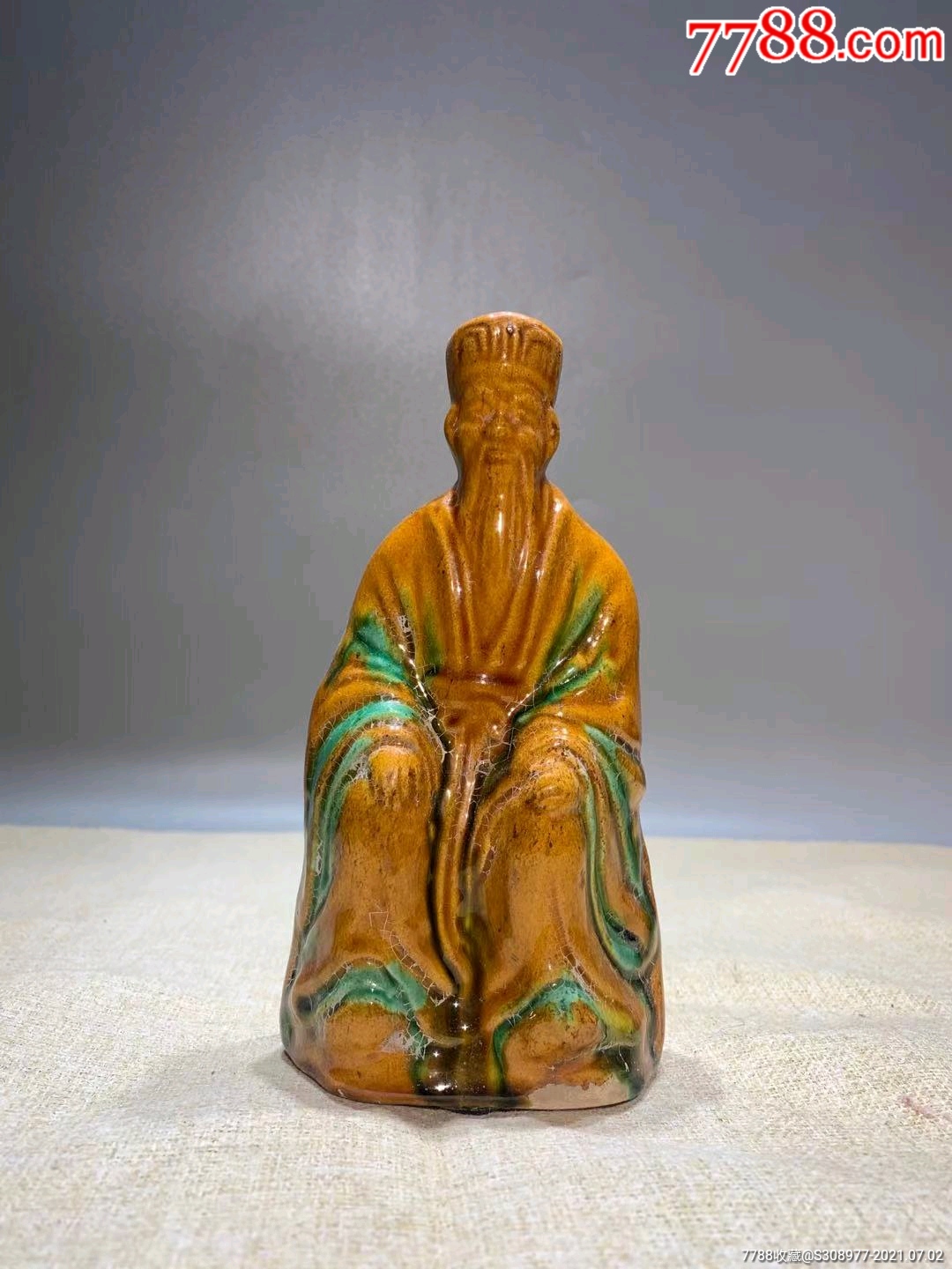 明代三彩土地瓷像