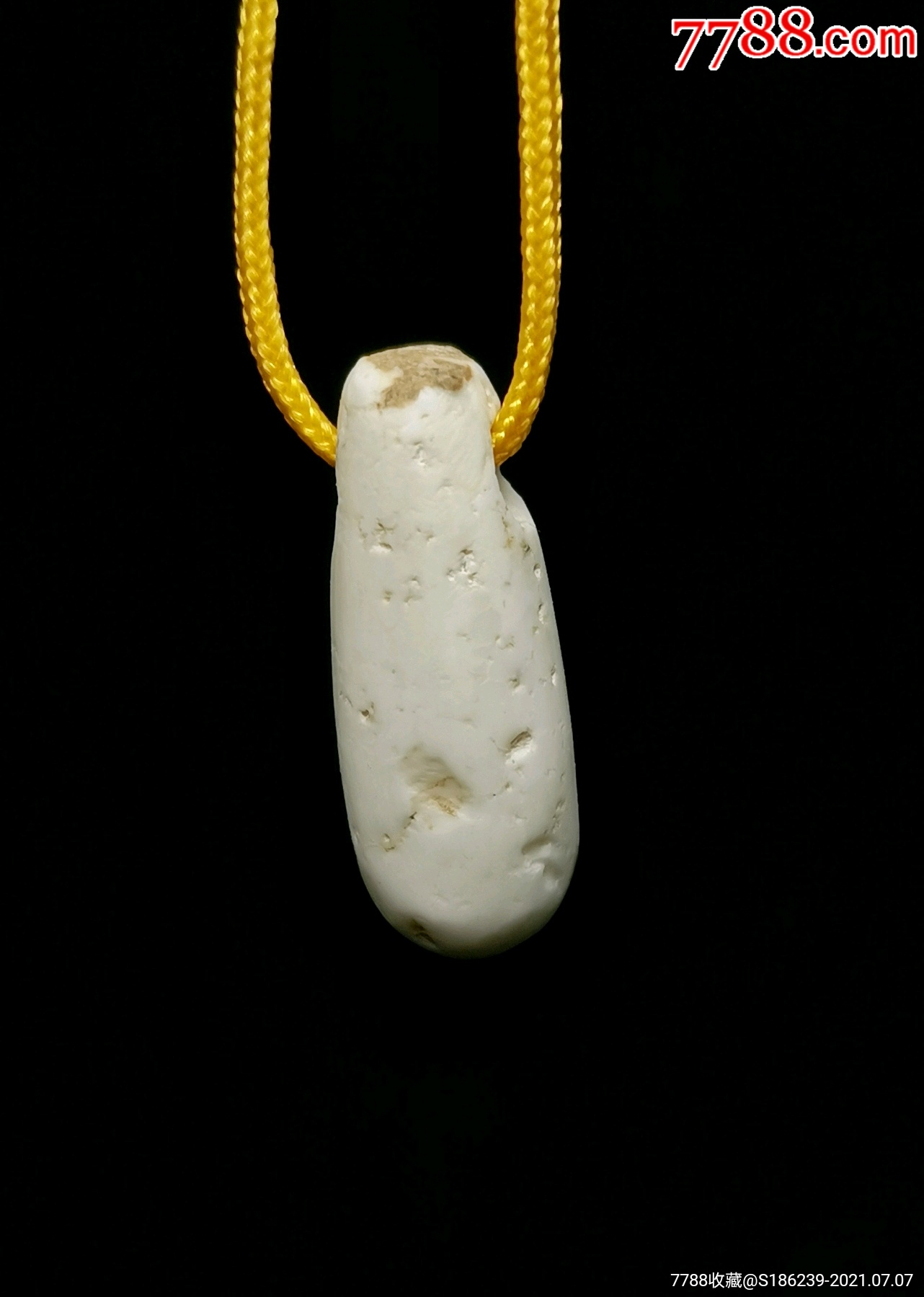 早期文化红山鸡骨白玉坠!