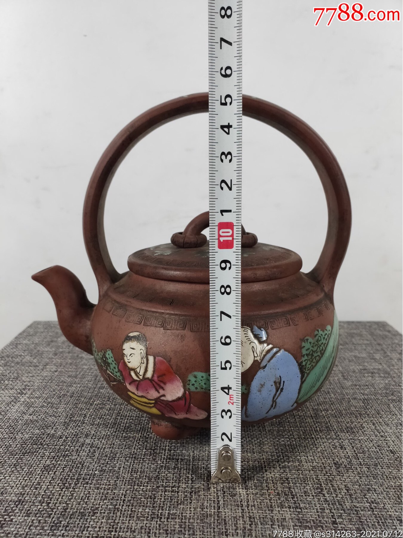 旧藏,【雍正赏壶,御制】款,画彩"提梁"独孔紫砂壶一把,出水流畅,断水