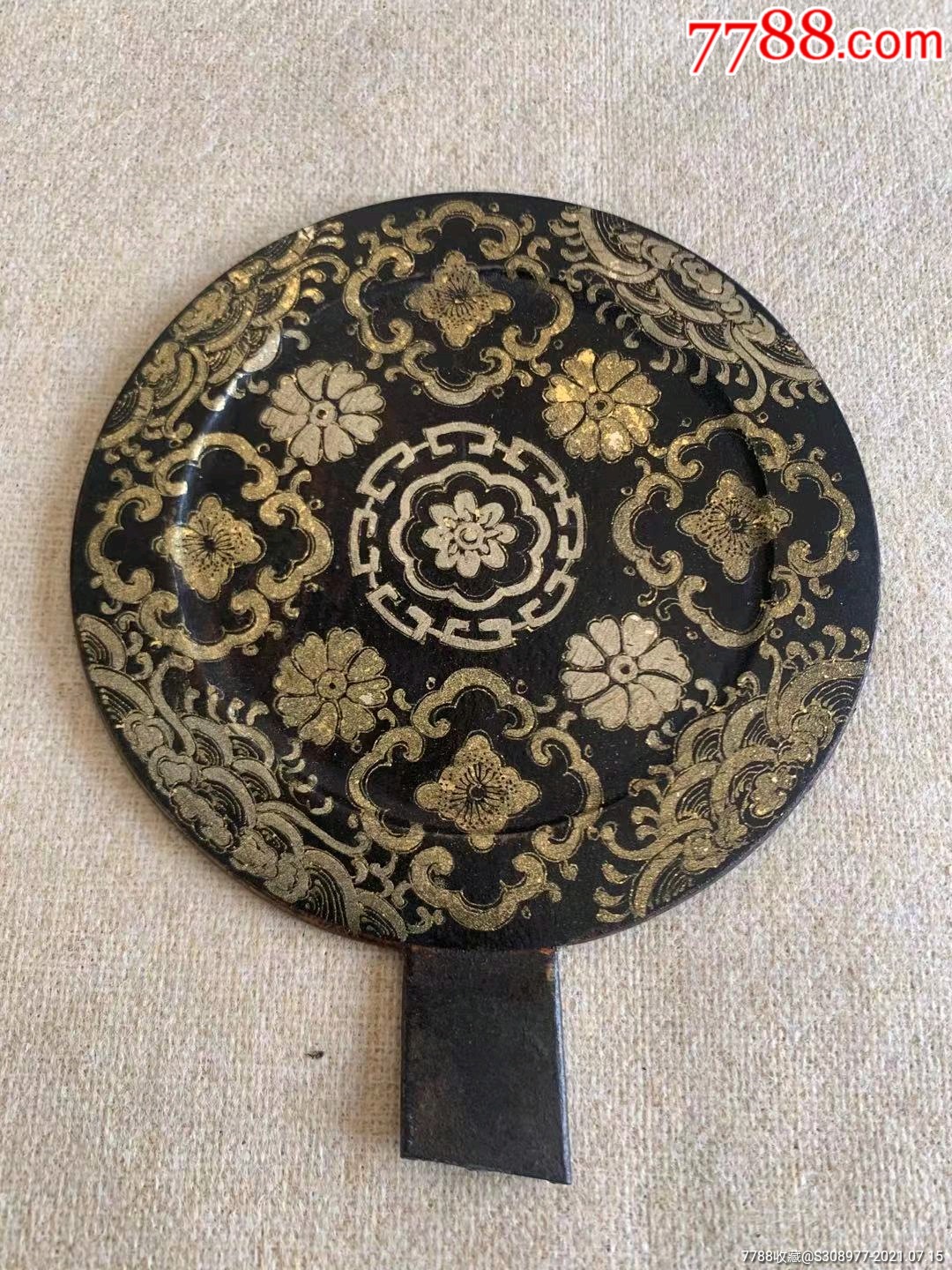 明代大漆描金花卉铜镜