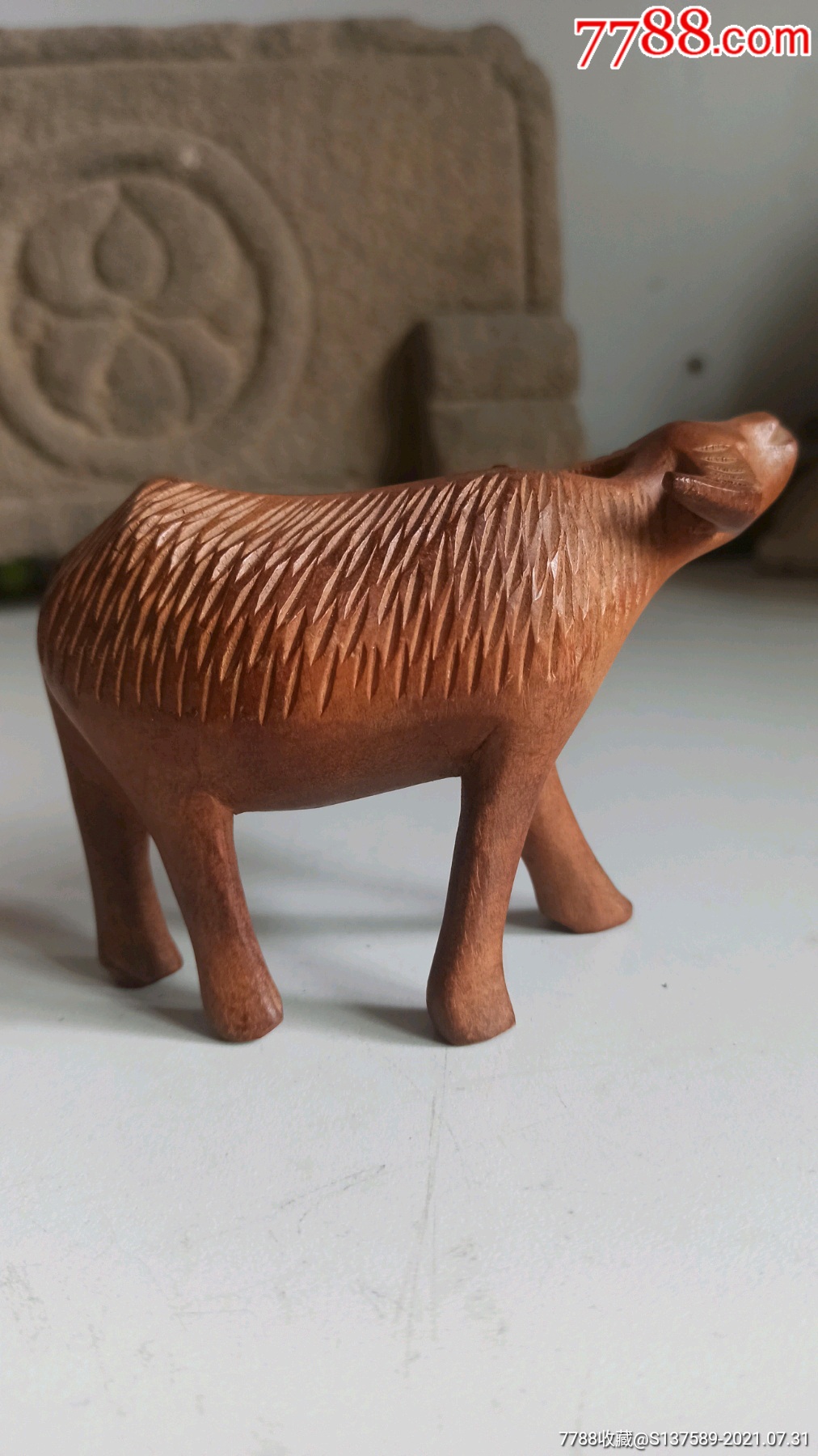 实木雕小牛摆件_木雕摆件_第1张_7788期刊网