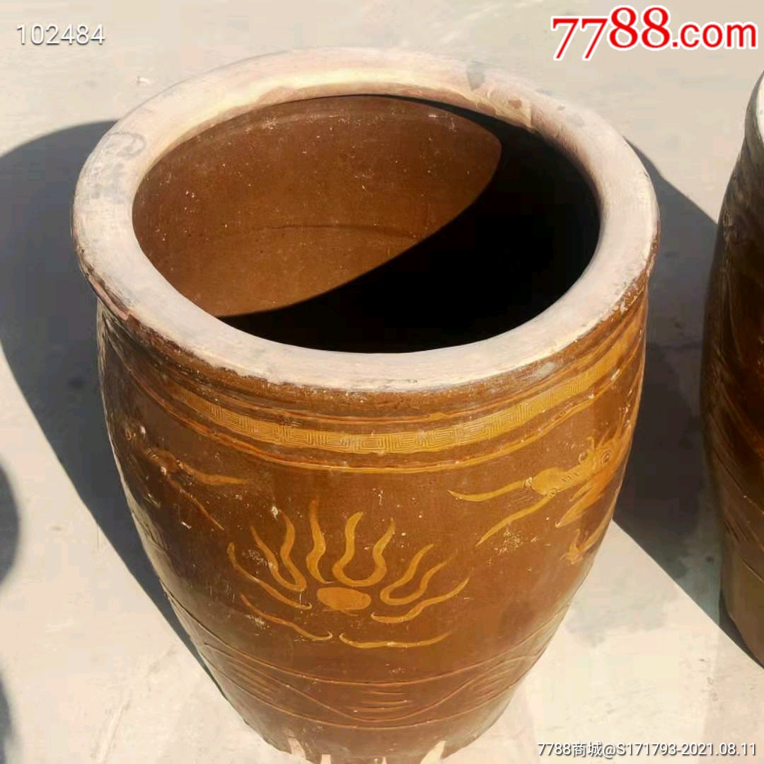 清末民初酱黄釉龙纹水缸一对