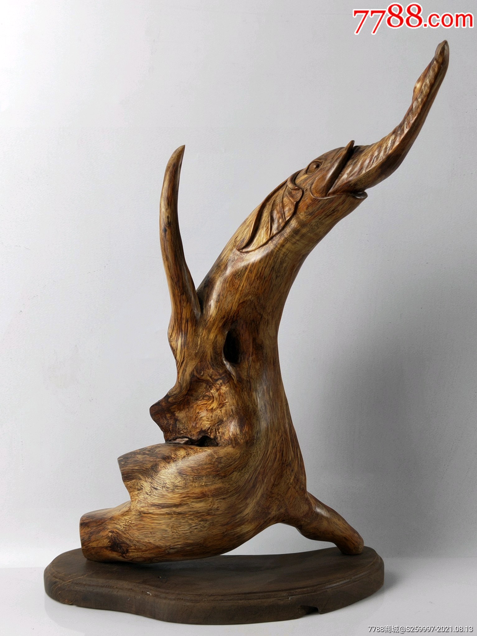 黄花梨随形雕摆件纹理清晰透彻摆放沉稳大气成色如图