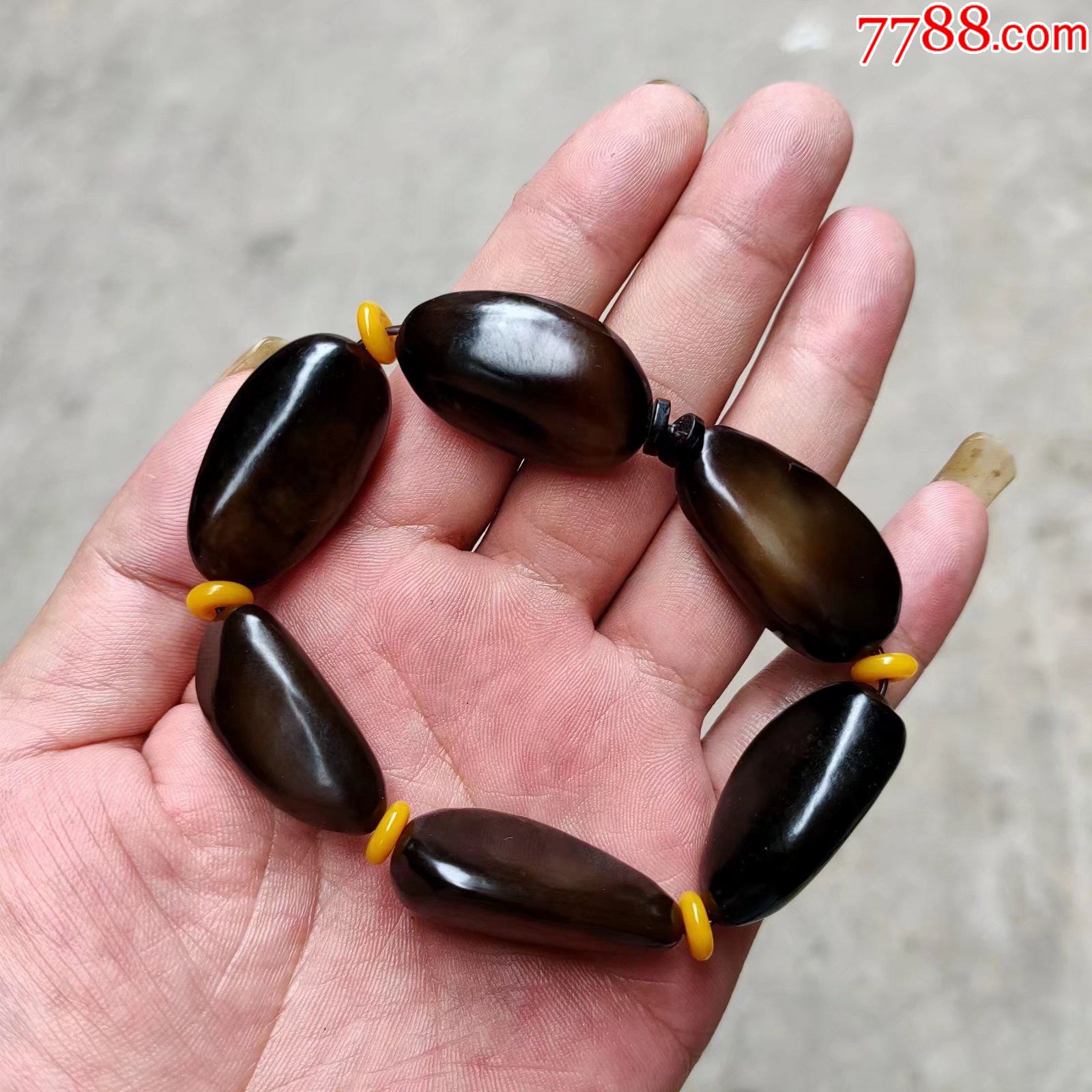 新疆和田黑皮仔料原石玉手串完整细腻黑亮亮的非常漂亮