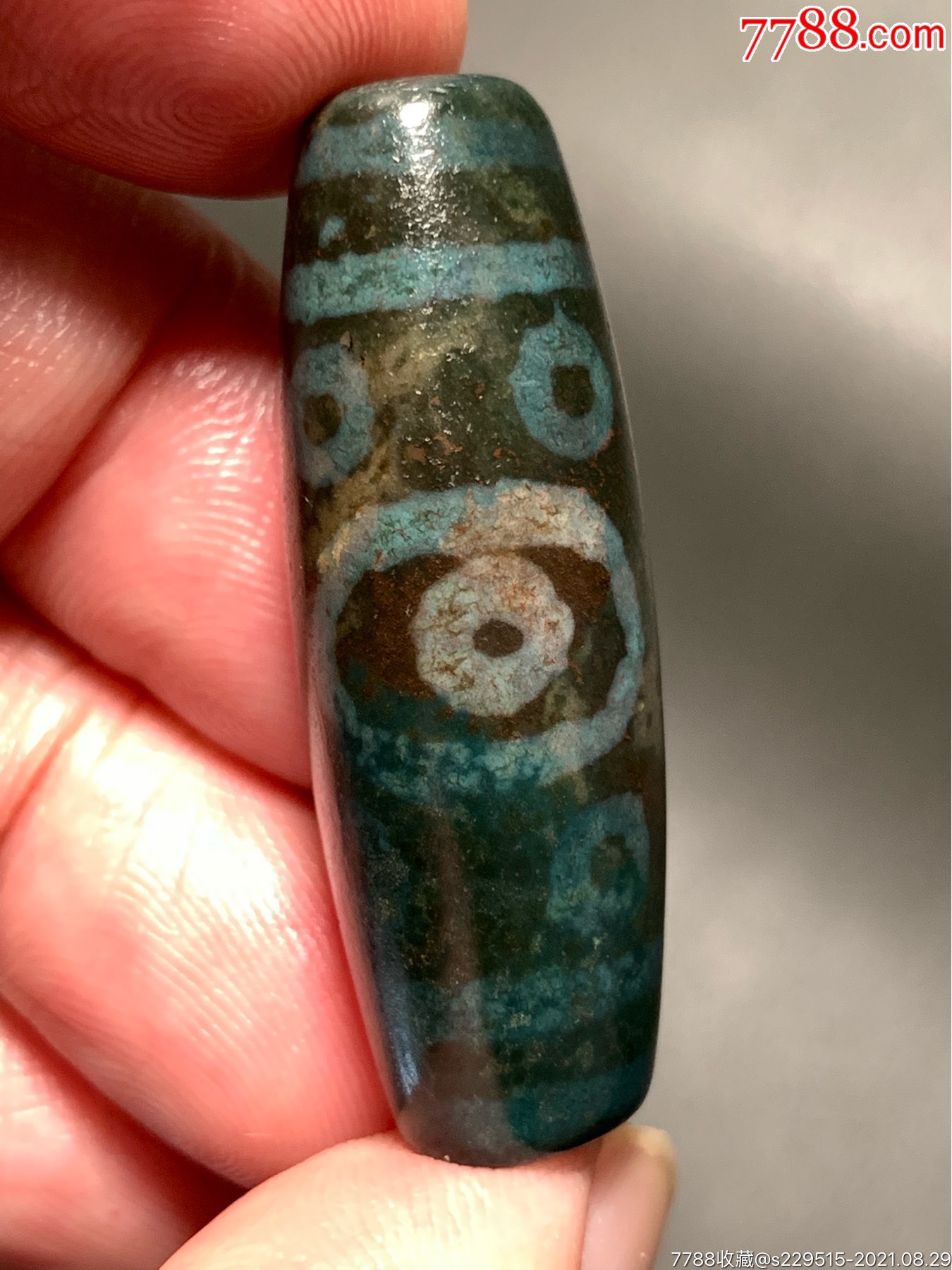 藏传带朱砂十一眼叁棱形绿皮象雄天珠40*13.8毫米