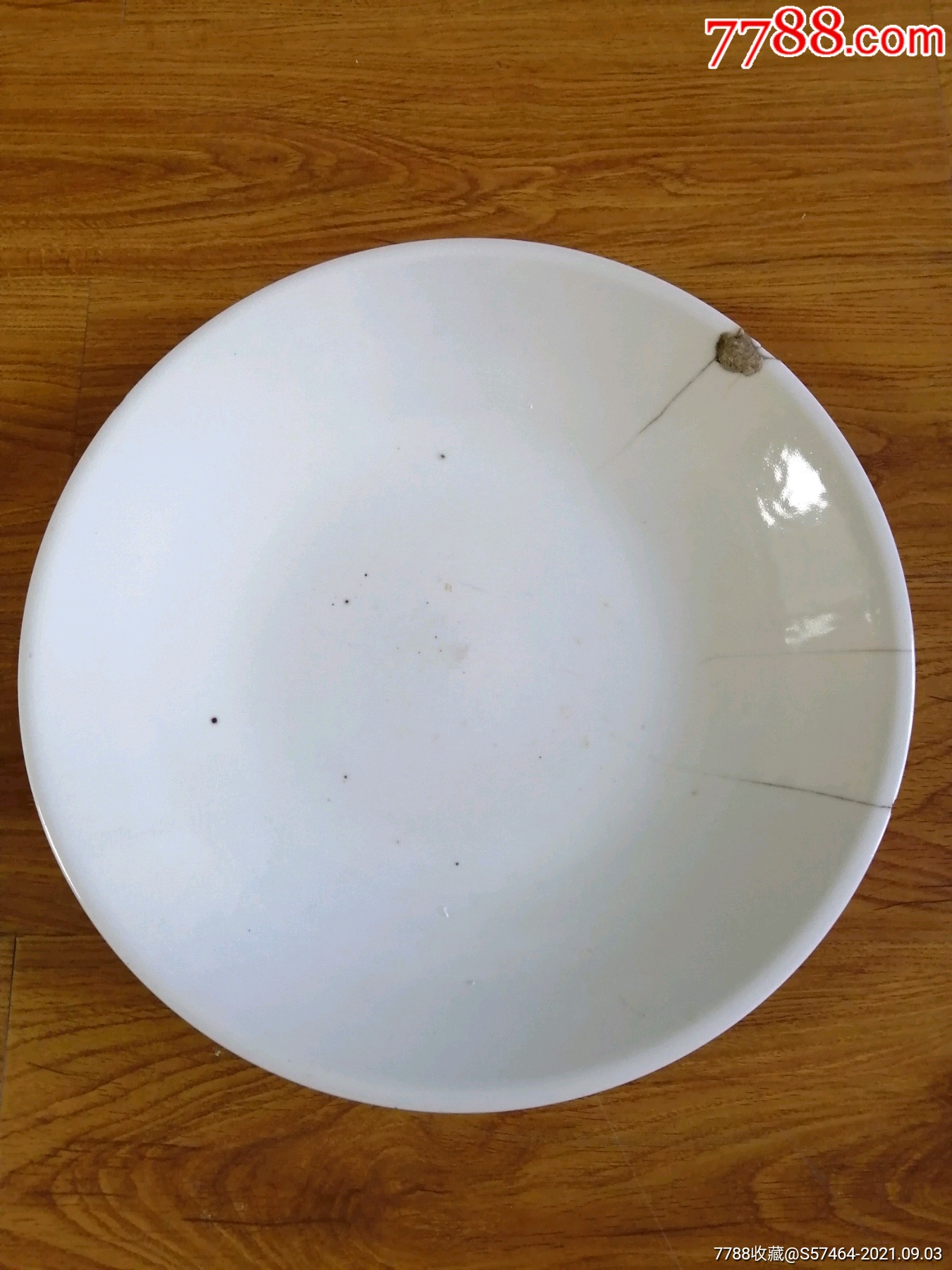 康熙甜白釉玉璧底大盘