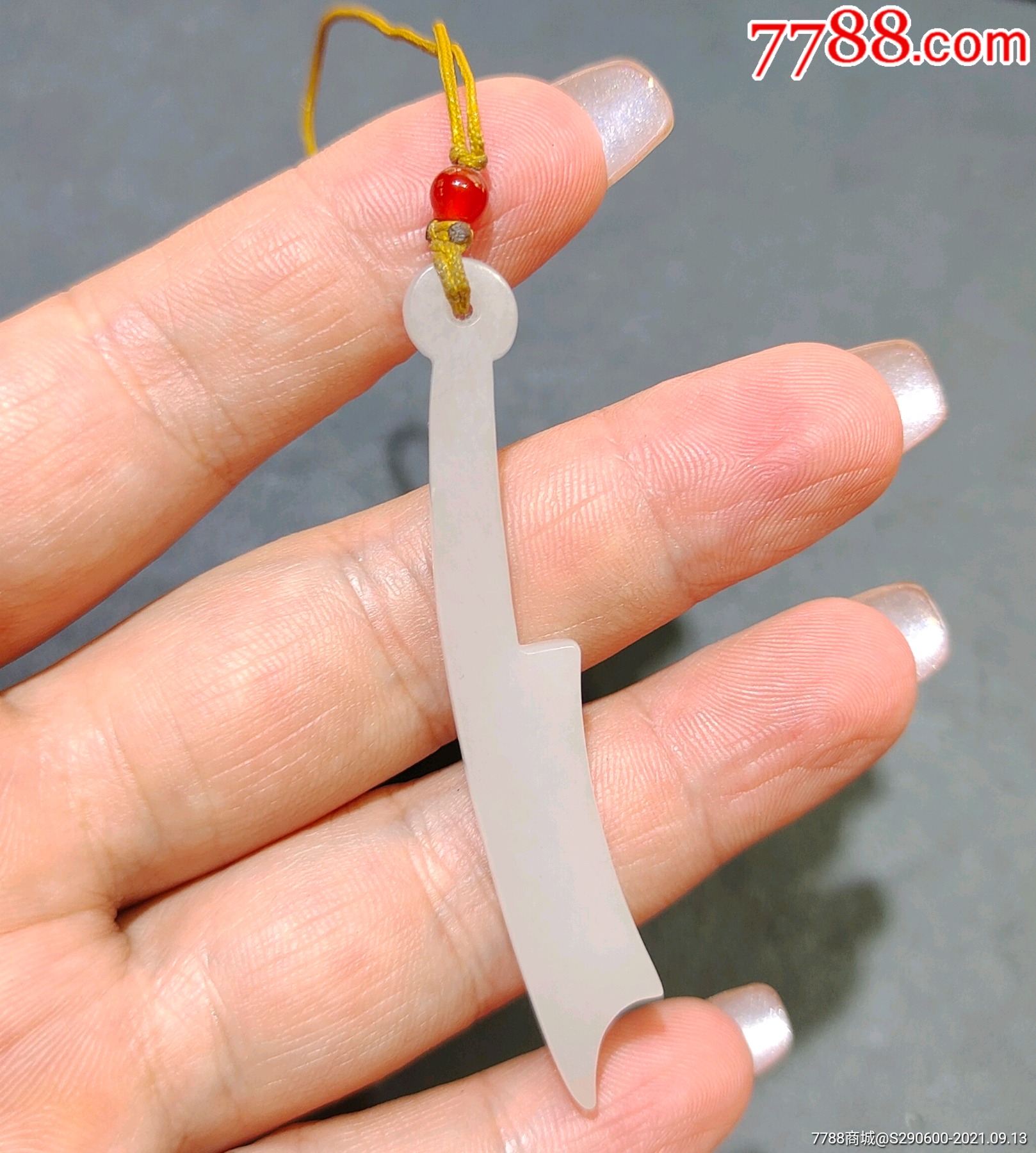 和田玉刀币一枚_和田玉_品种图片_收藏价格_7788核雕收藏