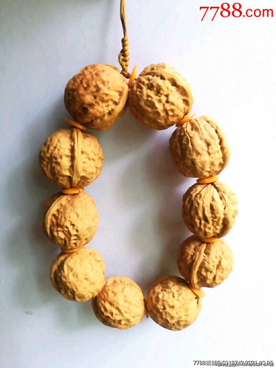 姜黄皮罗汉头10颗手持(尺寸33边34高33天然纯野生宝贝)_文玩核桃_半岛