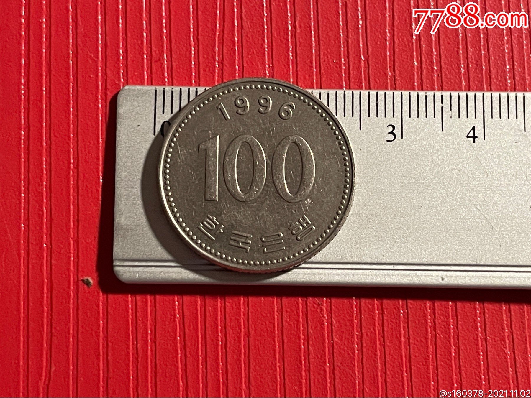 韩国面值100硬币图片图片