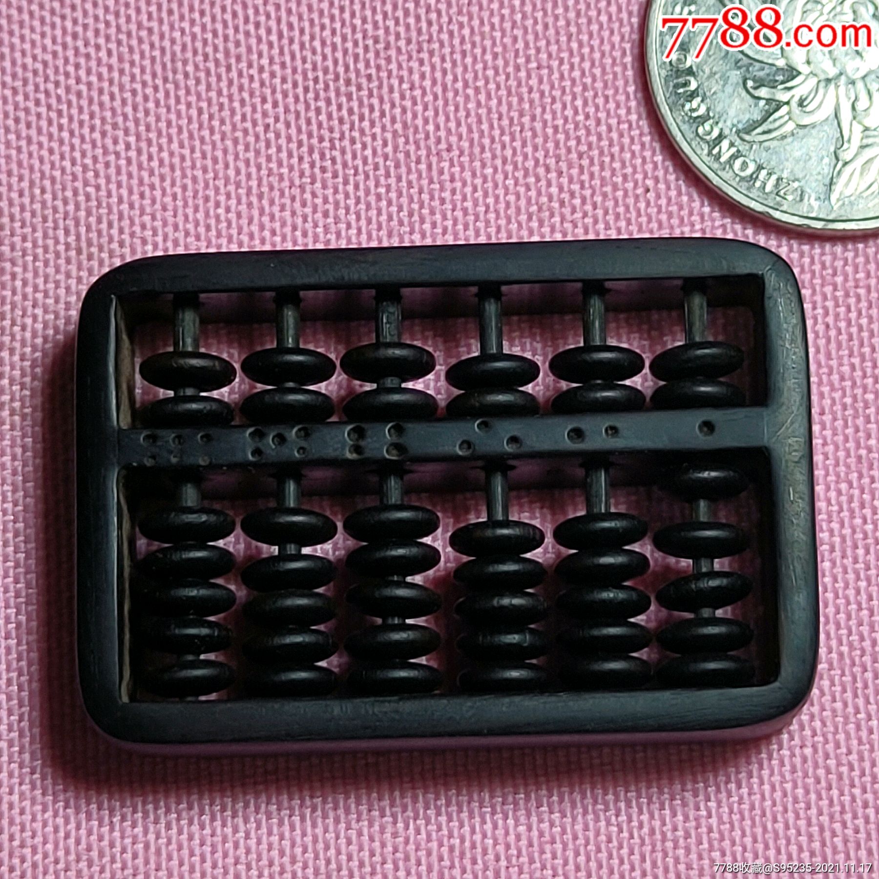 一个漂亮可爱的老红木如意小算盘小巧可爱六档每个算盘珠都能上下拨动