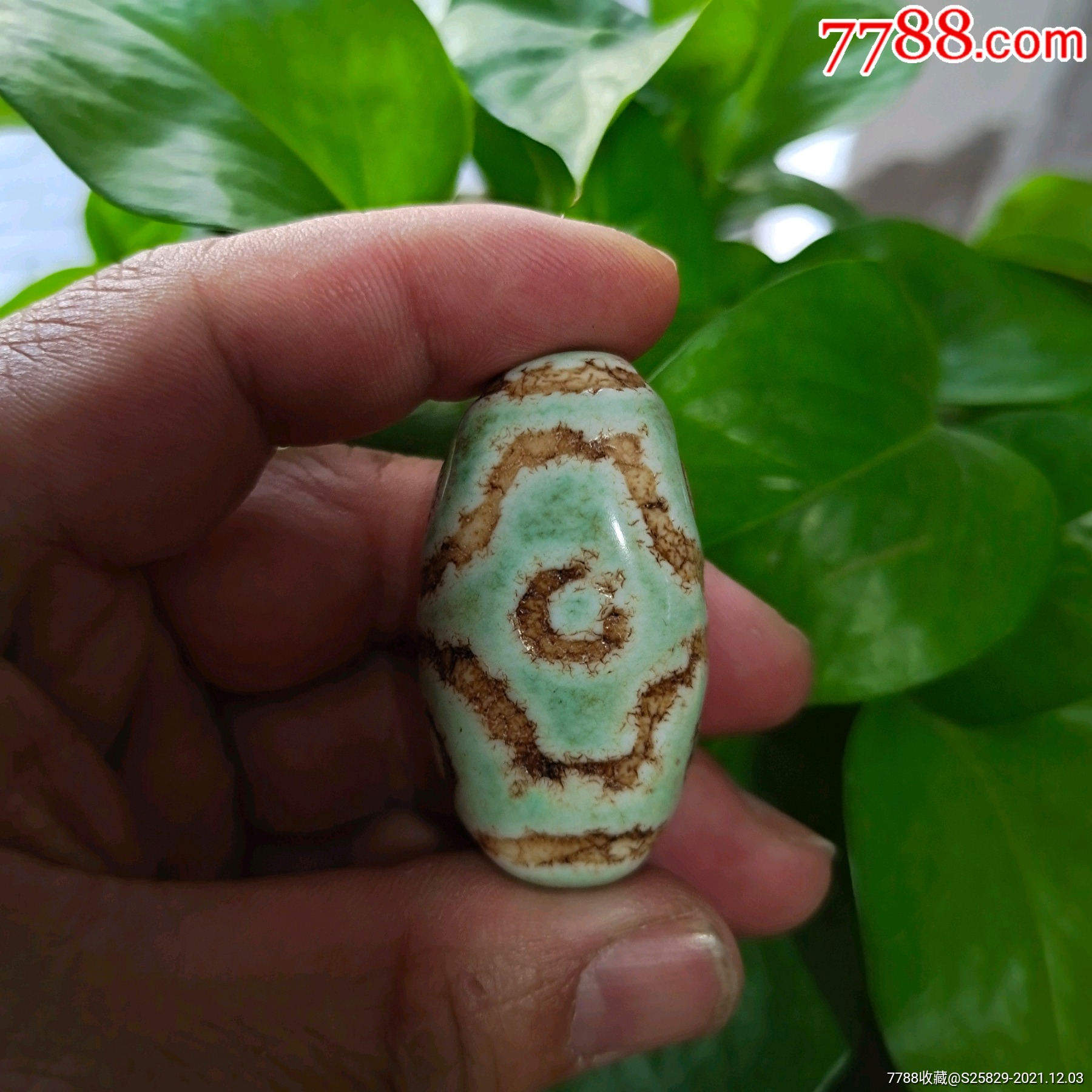 旧藏绿沁至纯三眼天珠