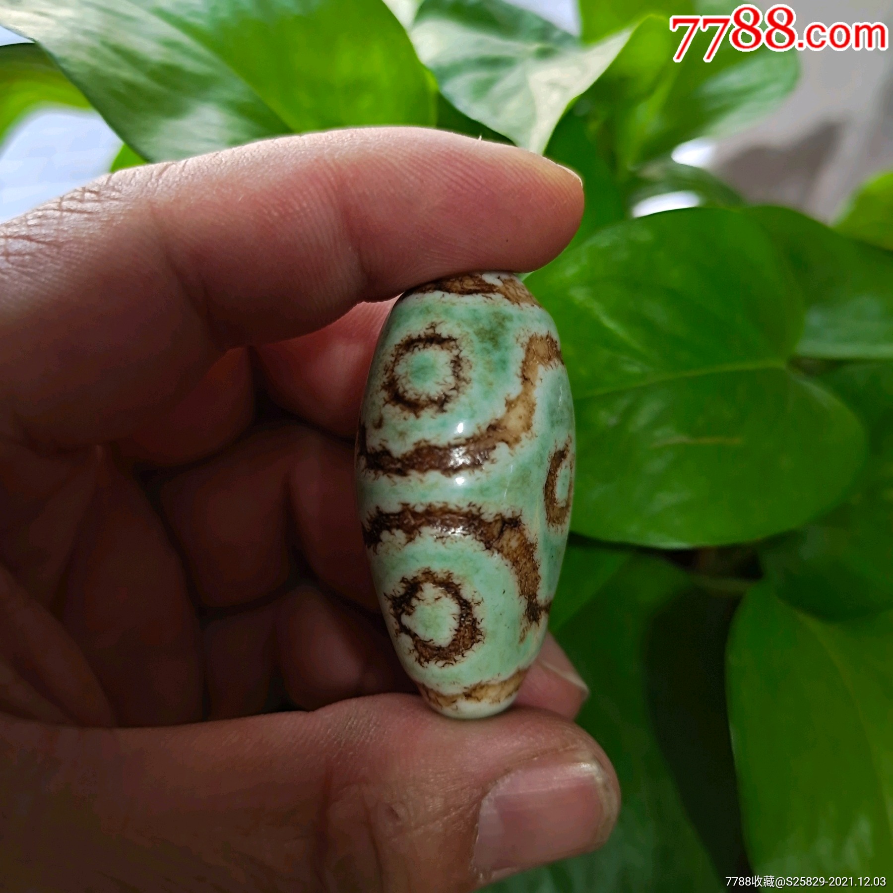 旧藏绿沁至纯三眼天珠