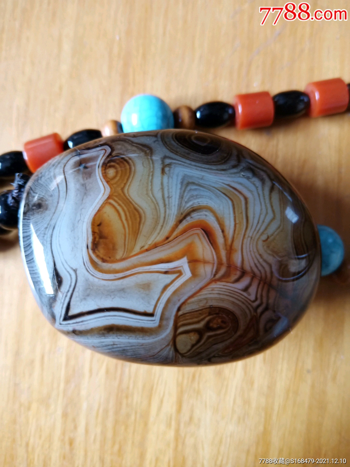 画面缠丝玛瑙手把件大佛