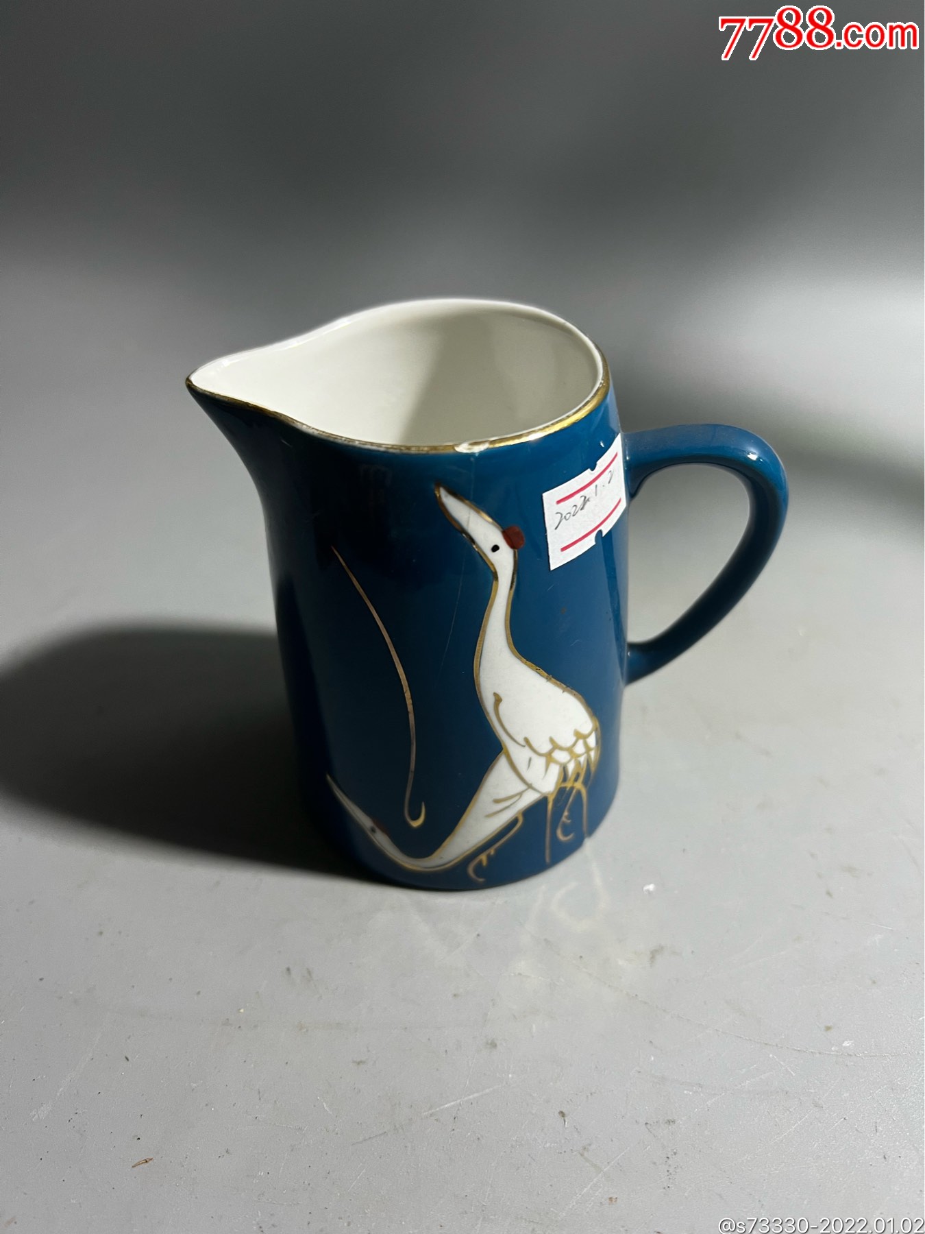 80年代左右蓝釉仙鹤公道杯一只开线