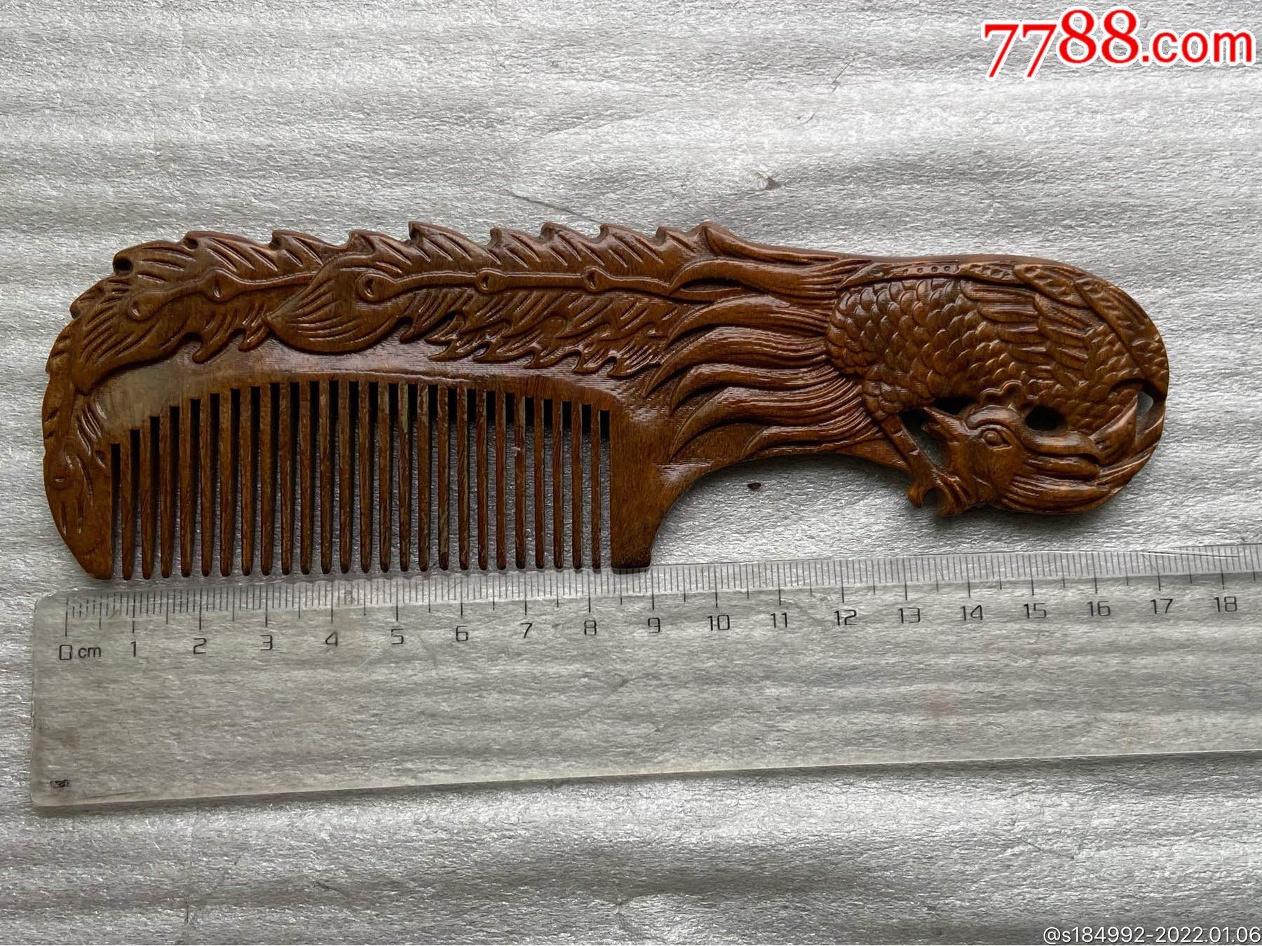 一把凤凰红木梳子