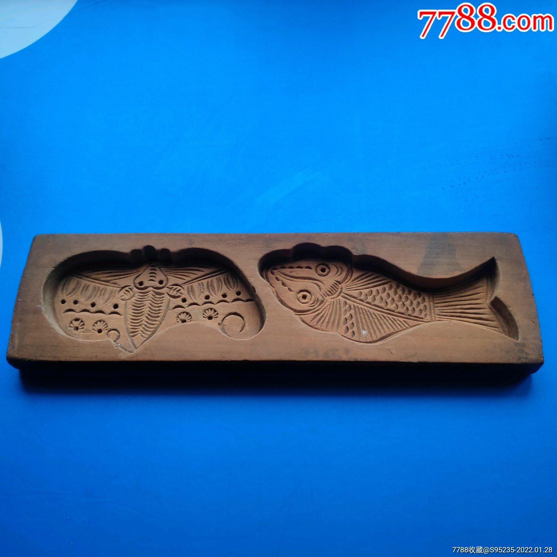 一块雕刻精美图案的印糕板