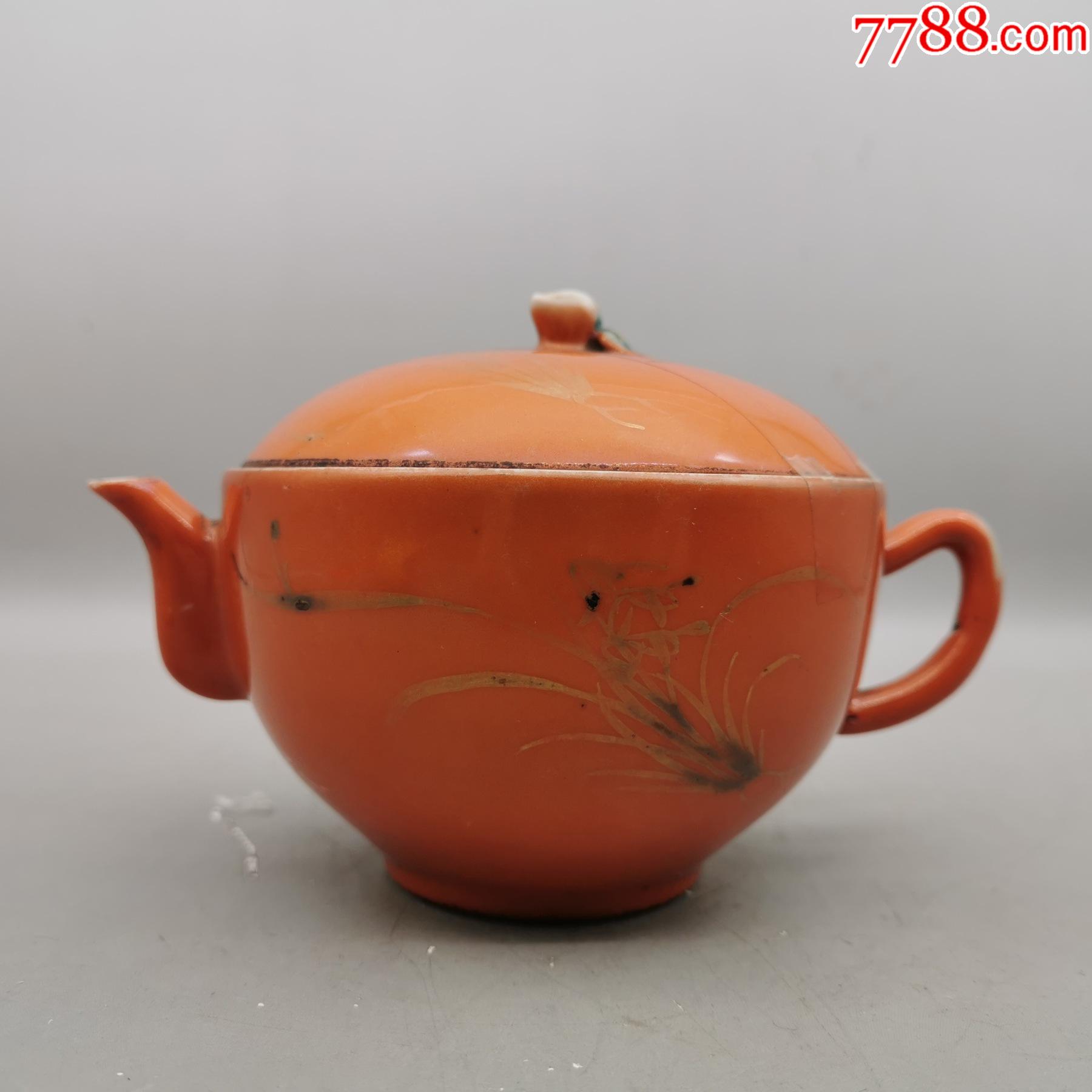 大清同治年制珊瑚红描金诗文兰花瓷茶壶