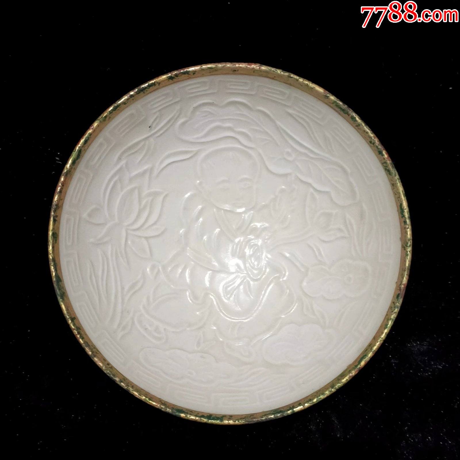 定窑釉下双面刻花人物包口碗