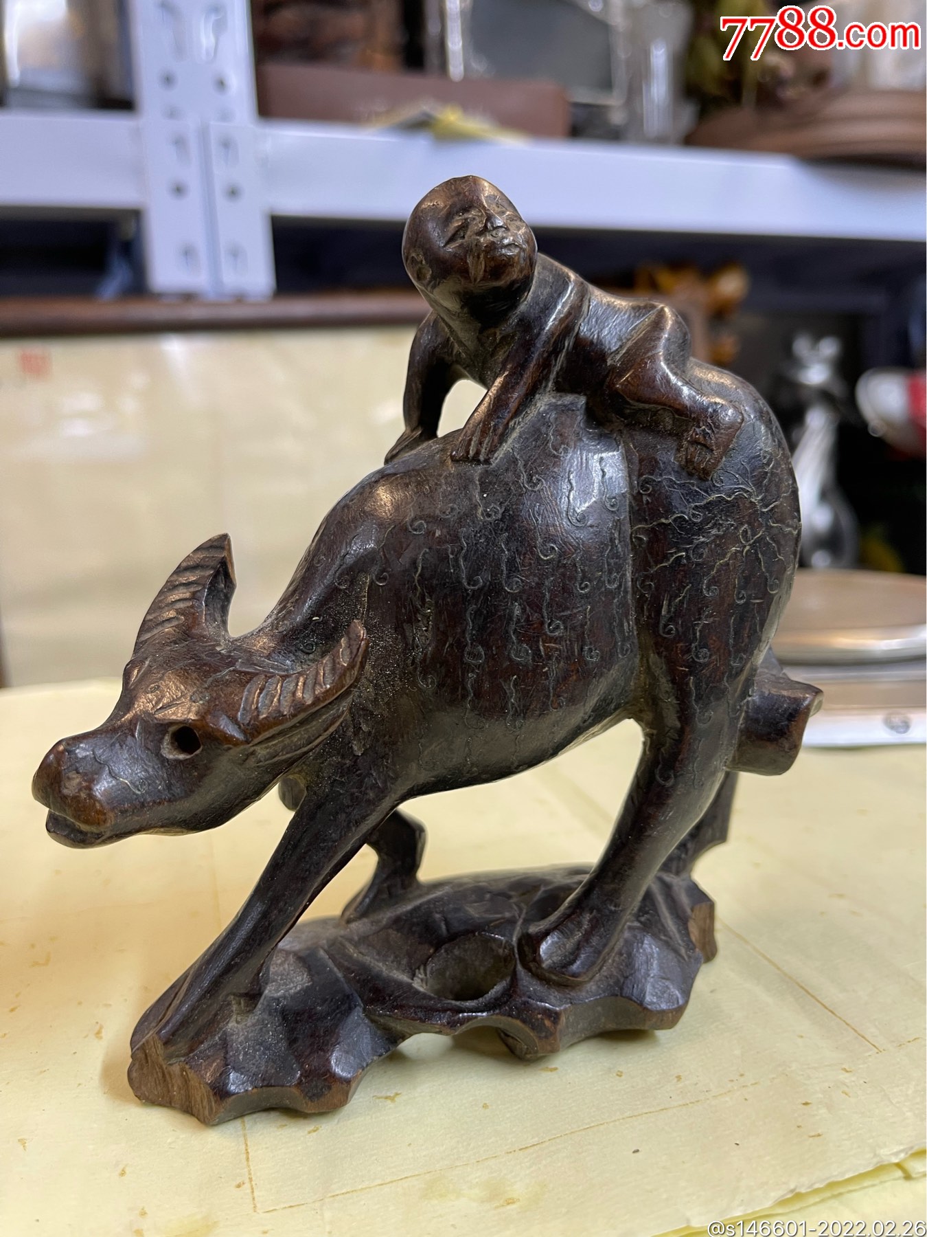 清镶嵌银丝牧童骑黄牛木雕包真