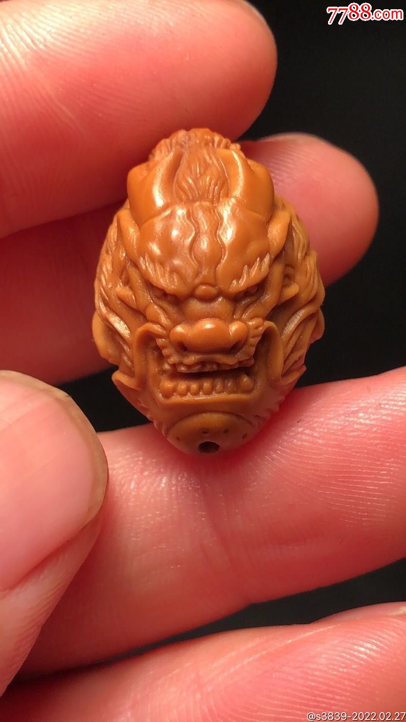 橄榄核雕龙头精品单籽