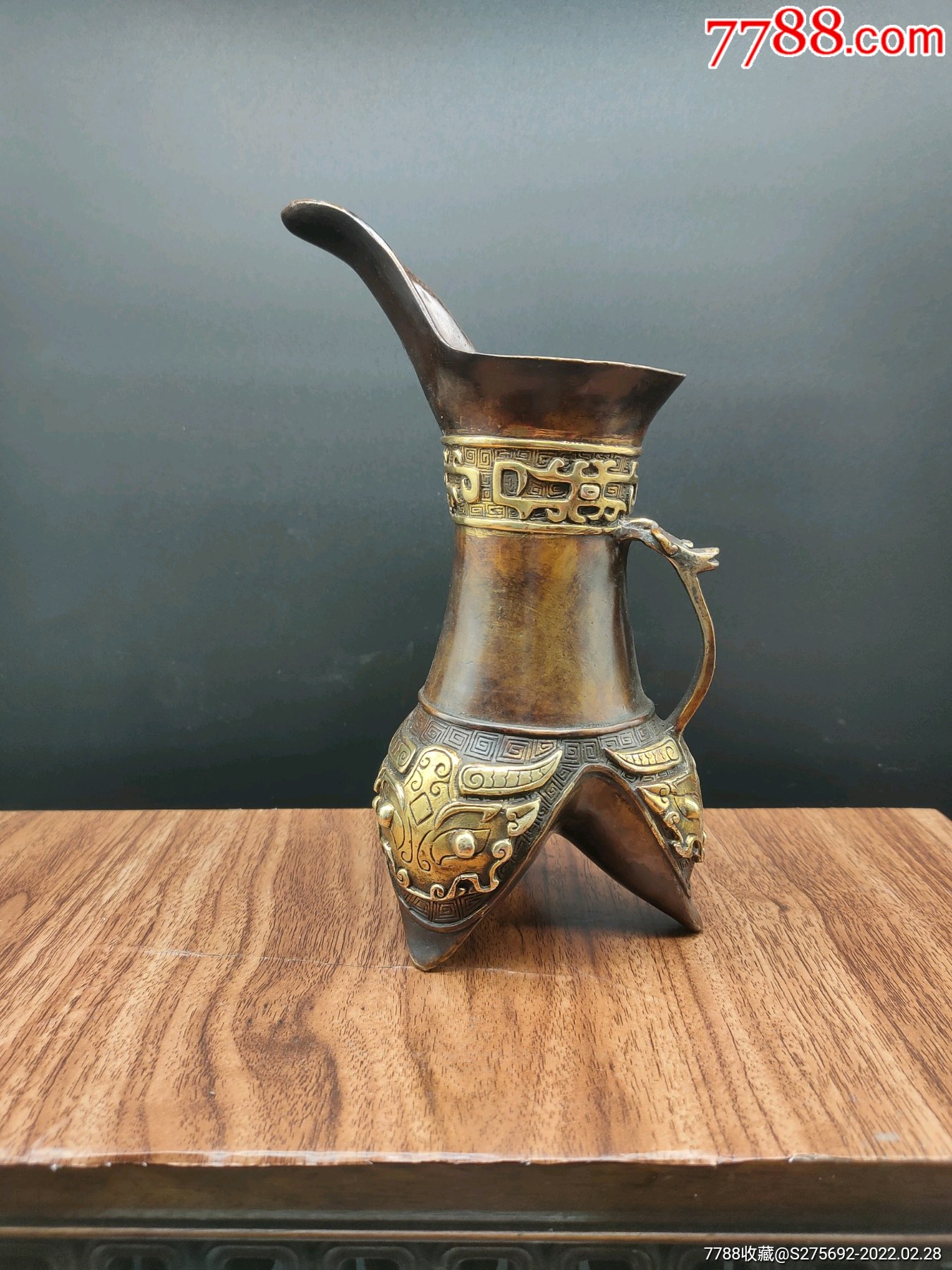 铜鎏金三脚兽杯